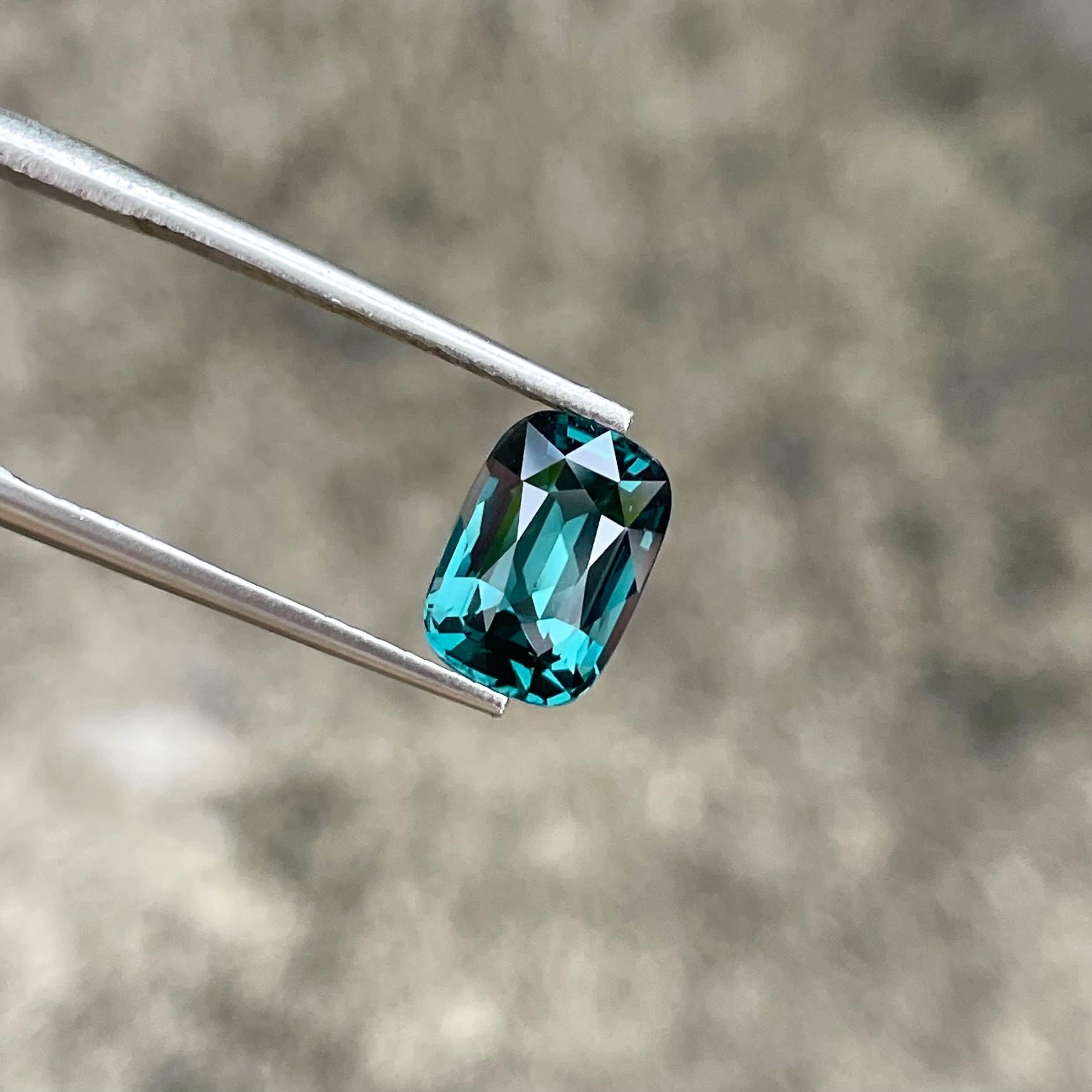 Weight 2.51 carats
Dimensions 9.4x6.5x4.8 mm
Clarity Eye Clean
Origin Sri Lanka
Treatment None
Shape Cushion
Cut Step Cushion Cut



This stunning 2.51-carat teal blue spinel is a natural gem sourced from the famed mines of Sri Lanka, renowned for