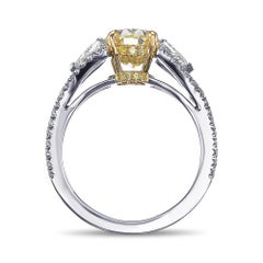 2.51 cts Certified Light Yellow Oval Three-stone Diamond Ring