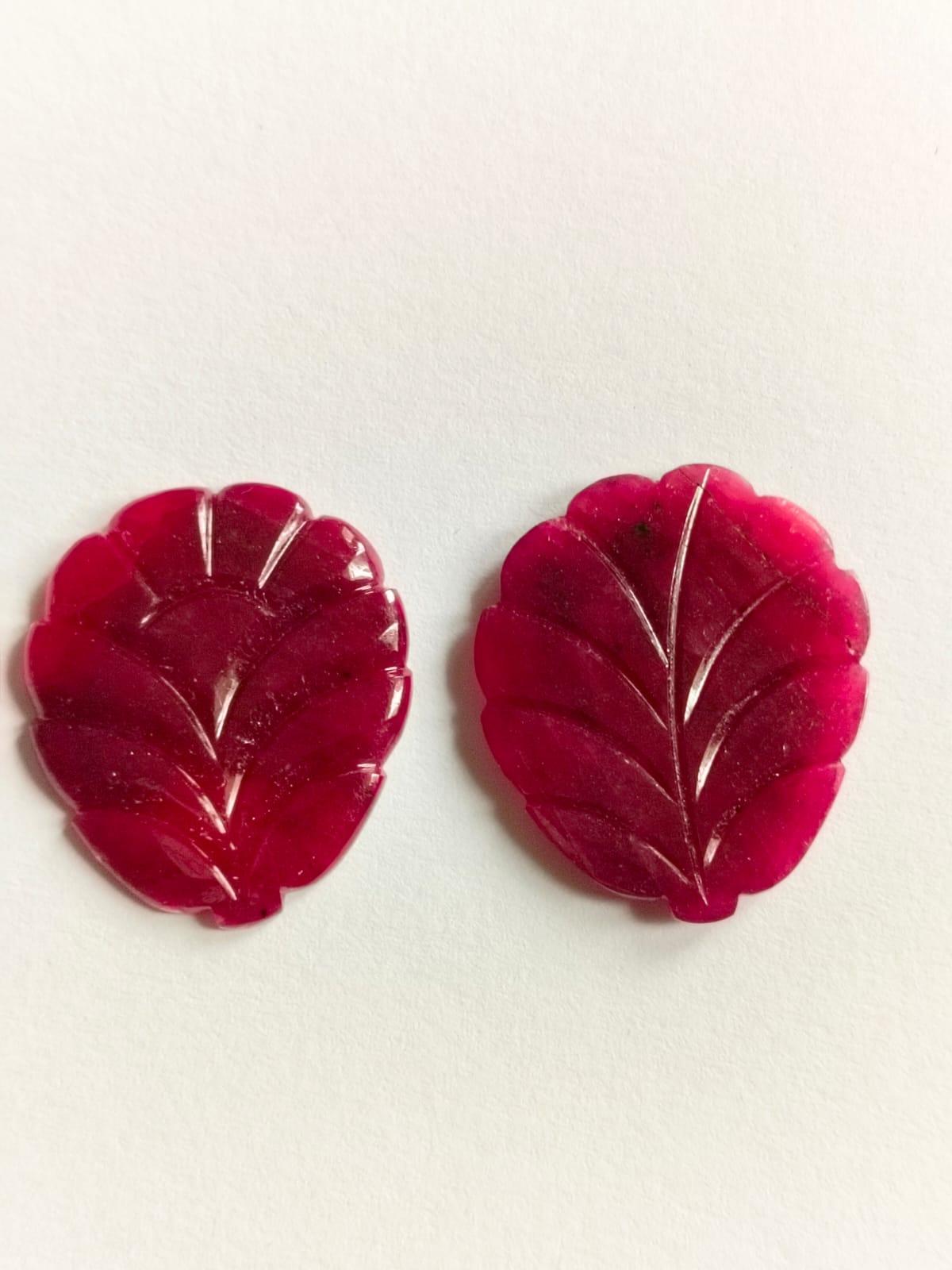Oval Cut 25.14 Carat Ruby Carving Leaf Shape Pair Loose Gemstone For Sale