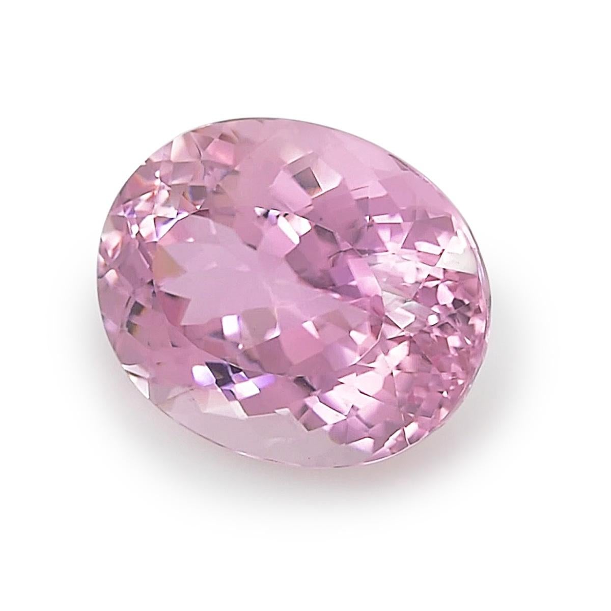 Eye clean with an even bougainvillea, floral pink, here is a 25.14 carat natural Kunzite that will make a stunning choice for a statement ring. Excellent cut paired with its oval shape is what will make this gemstone a powerful yet contemporary