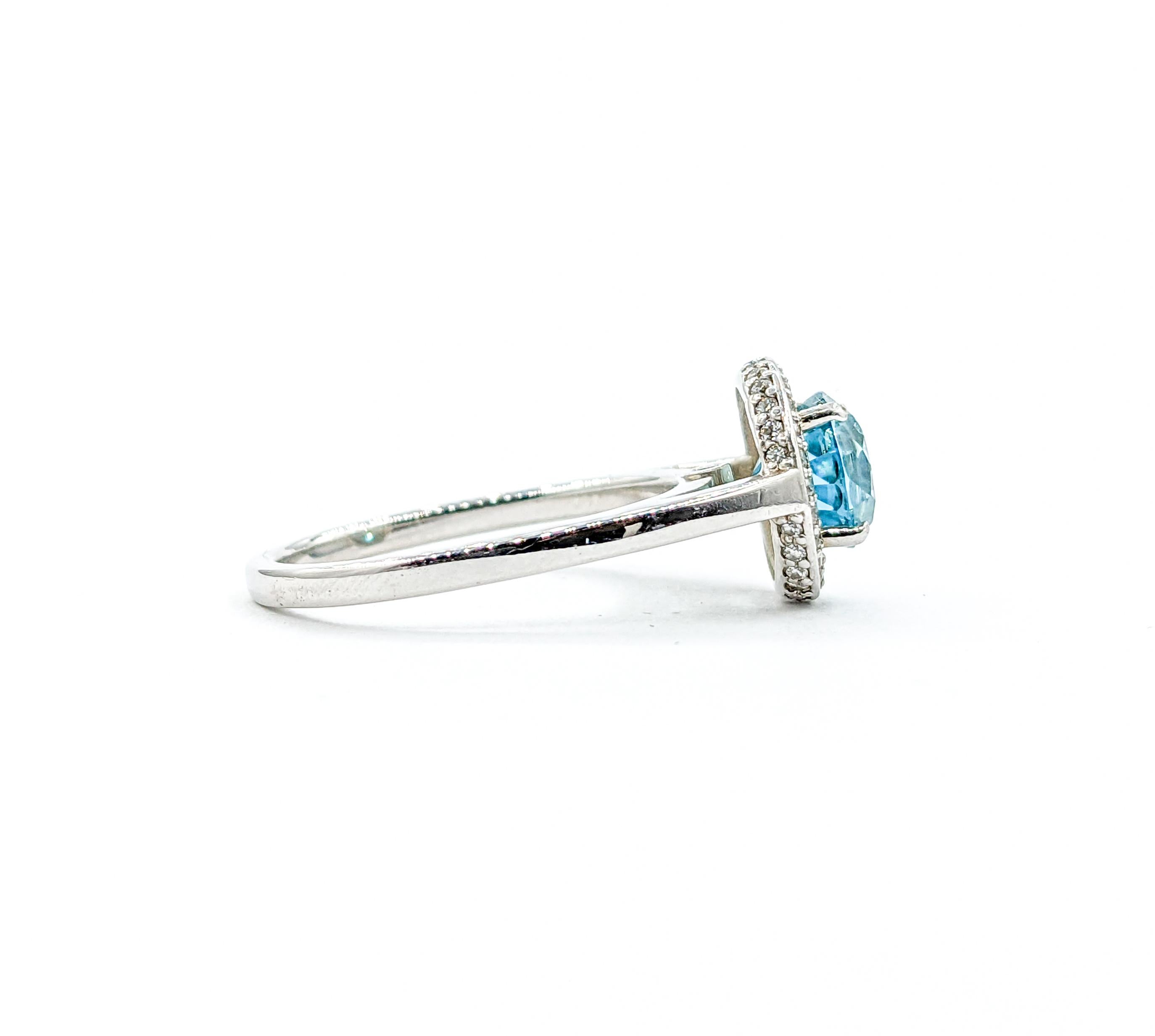 Modern 2.51ct Blue Zircon & Diamond Halo Ring In White Gold For Sale