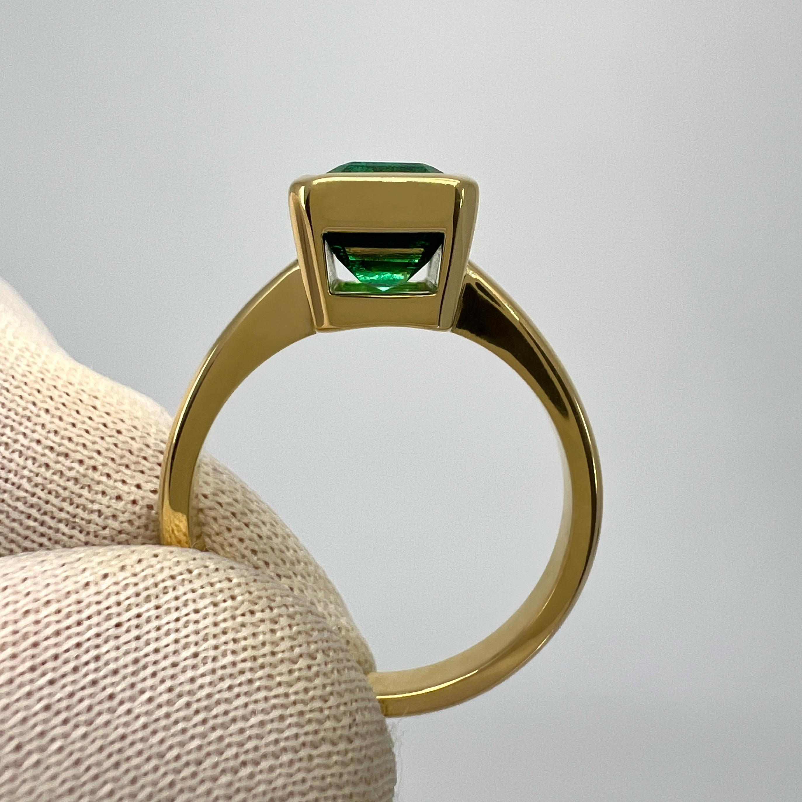 Women's or Men's 2.51ct Deep Green Emerald Octagon 18k Yellow Gold Rubover Bezel Solitaire Ring For Sale