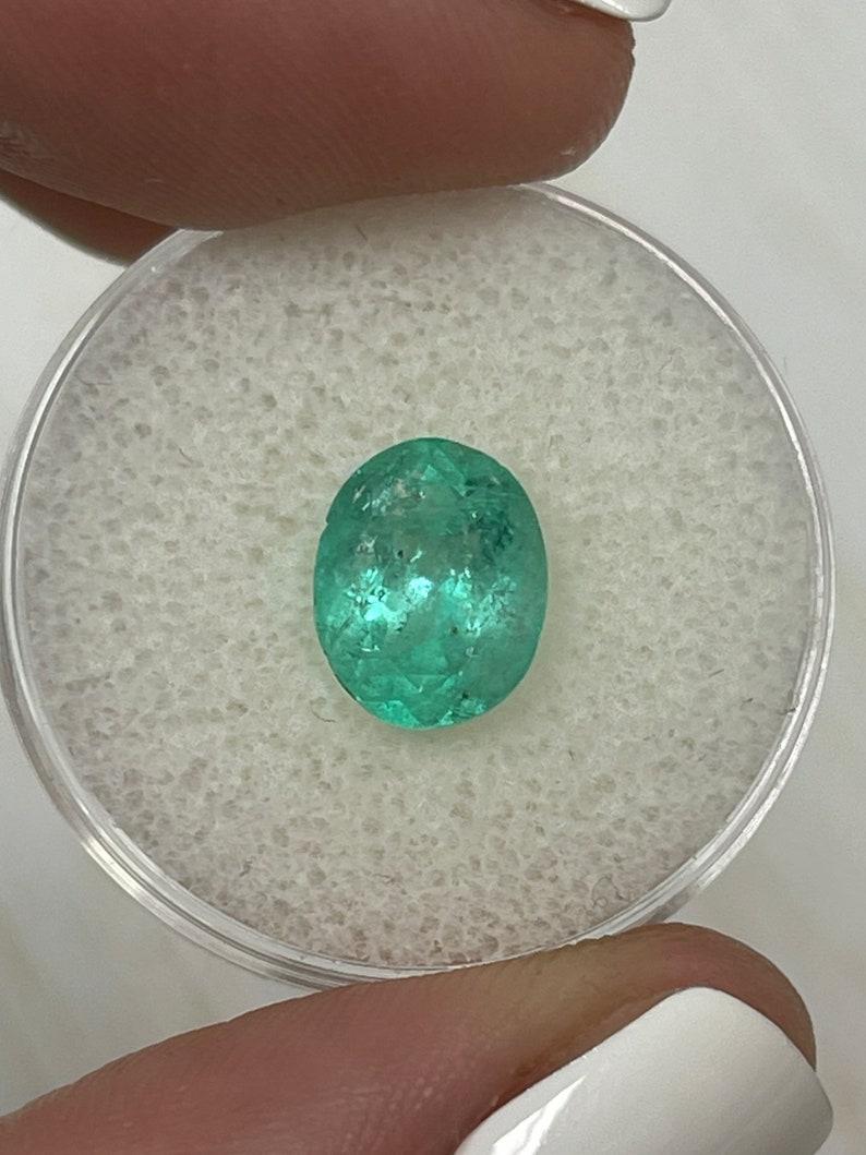 2,52 Quilates 10x8 Esmeralda Colombiana Verde Azulado Terroso - Gema Mayo Talla Ovalada Corte oval en venta