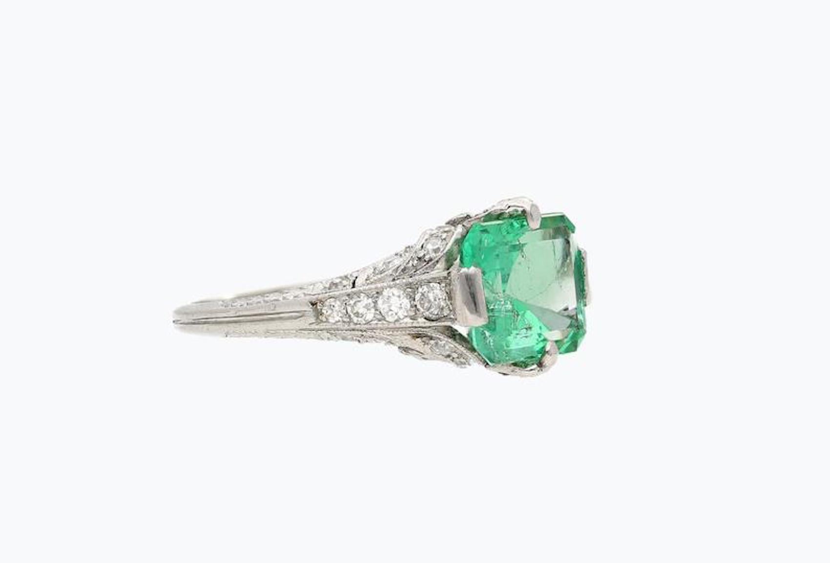 Details:
✔Era: Art Deco
✔Size: 7 US
✔Metal: Platinum
✔Gemstone: Emerald
✔Gem color: Green
✔ Setting: Platinum PT900
✔ Emerald Weight: 2.52 carats
✔ Emerald Cut: Emerald
✔ Emerald Origin: Colombia 
✔ 8 Round, Old cut diamonds
✔ Diamonds: 8 Old-Mine