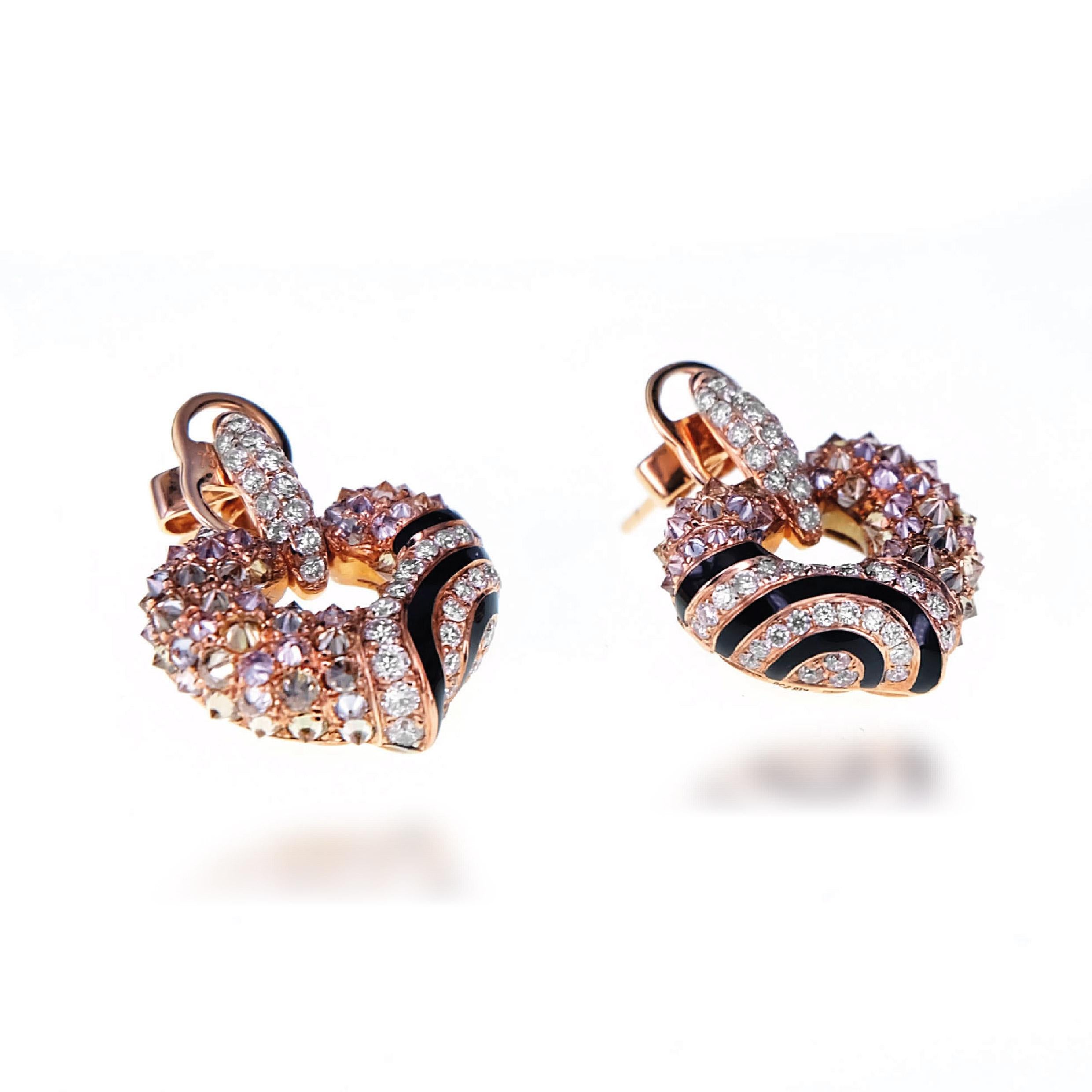 2.52 carat of natural fancy color diamond are set along with onyx in this art deco style earring. 
The details of the earring are as follows:
Color: F
Clarity: VS
The diamonds are set in an upside down setting to give the earring a 3 Dimensional