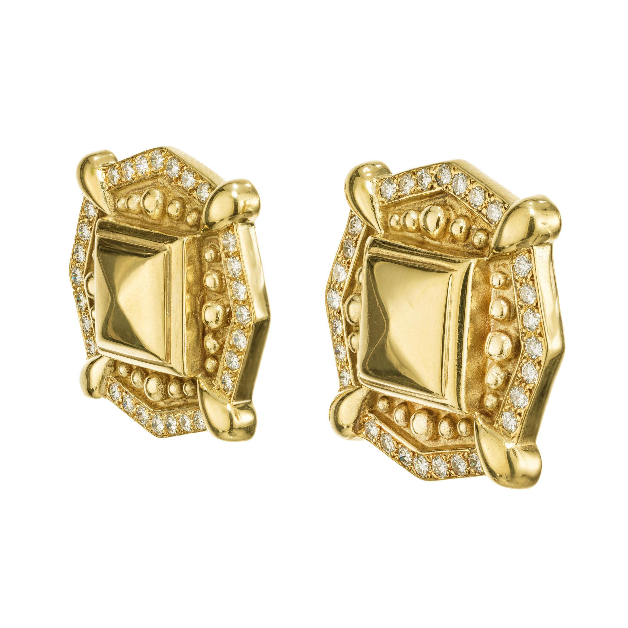 Mid-Century 1960's, Etruscan styled, European crafted textured Diamond lever back earrings in 18k yellow gold. Texted and detailed, these octagon clip post earrings are adorned with a halo of round cut diamonds, 56 diamonds with a total of 2.52cts.