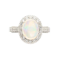 2.52 Carat Oval Opal & Diamond Halo 14K White Gold Cathedral Ring