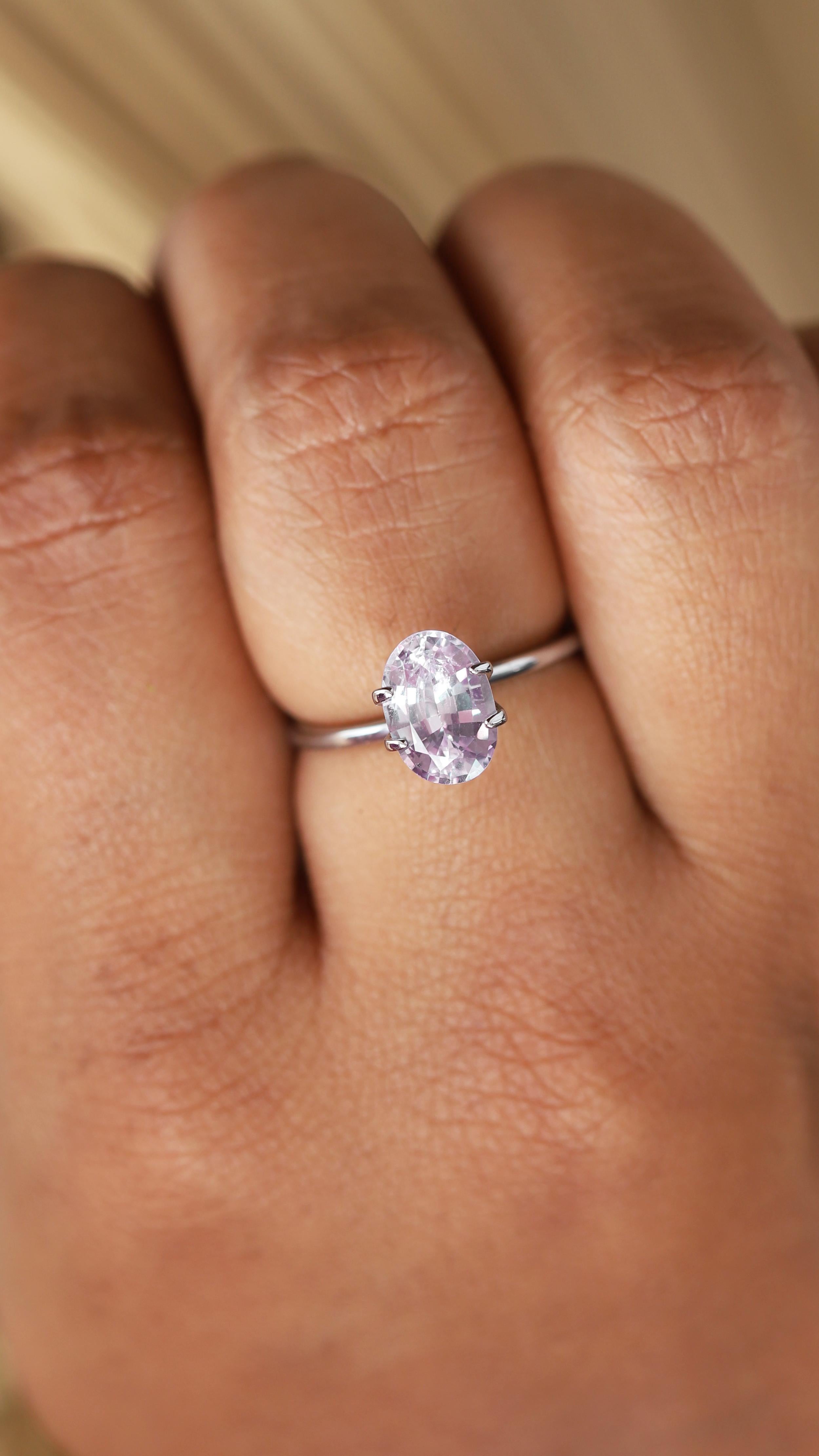 The serene beauty of this gem is in its subtlety - soft, muted hues that enchant the senses. In the softest shade of powder pink, this pastel sapphire exudes sweet elegance and shimmers gracefully in light.

Natural pastel pink sapphire. Sourced