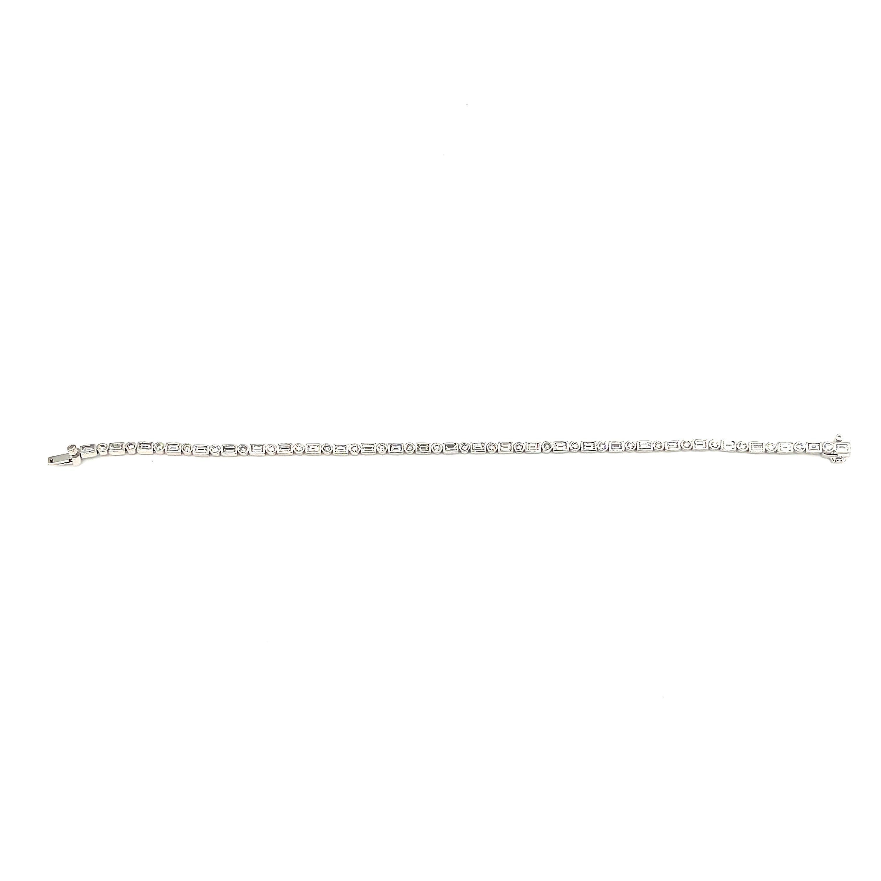 This beautiful diamond bracelet boasts 57 diamonds set in 18k white gold. The diamonds are E/F in color and VS in quality. A stunning bracelet to wear everyday or a night out on the town!