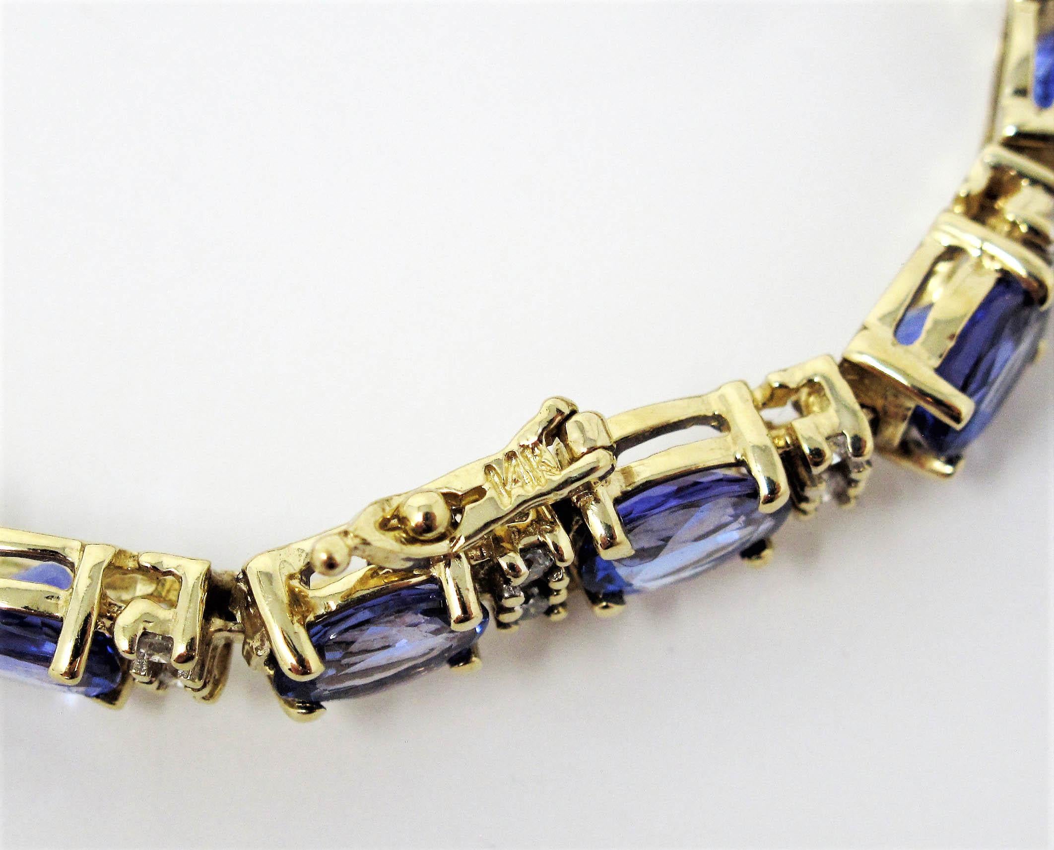 Bracelet tennis en or jaune 14 carats avec tanzanite et diamants de 25 carats en vente 4