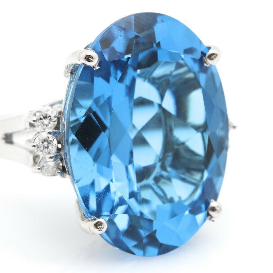 25.25 Carats Impressive Natural Swiss Blue Topaz and Diamond 14K Solid White Gold Ring

Total Topaz Weight is: Approx. 25.00 Carats

Topaz Treatment: Heating

Topaz Measures: Approx. 22.00 x 16.00mm

Natural Round Diamonds Weight: Approx. 0.25