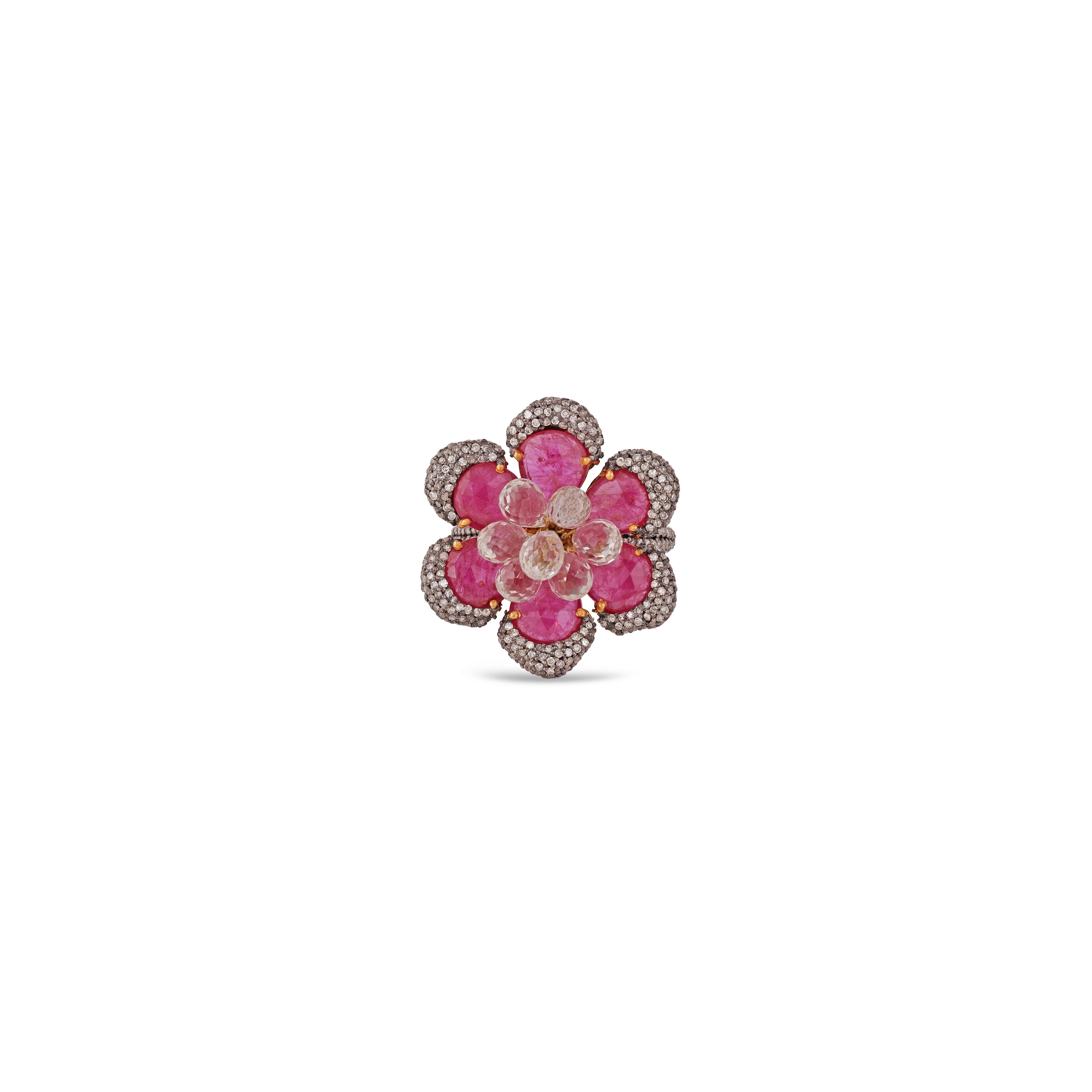 It is an exclusive Flower cocktail ring in a victorian style that features a carved Ruby weight 6.37 carats, White Sapphire weight 5.34 carats with diamonds 0.96 carat which contains 18k gold & silver, this is a gorgeous fancy ring to wear.

