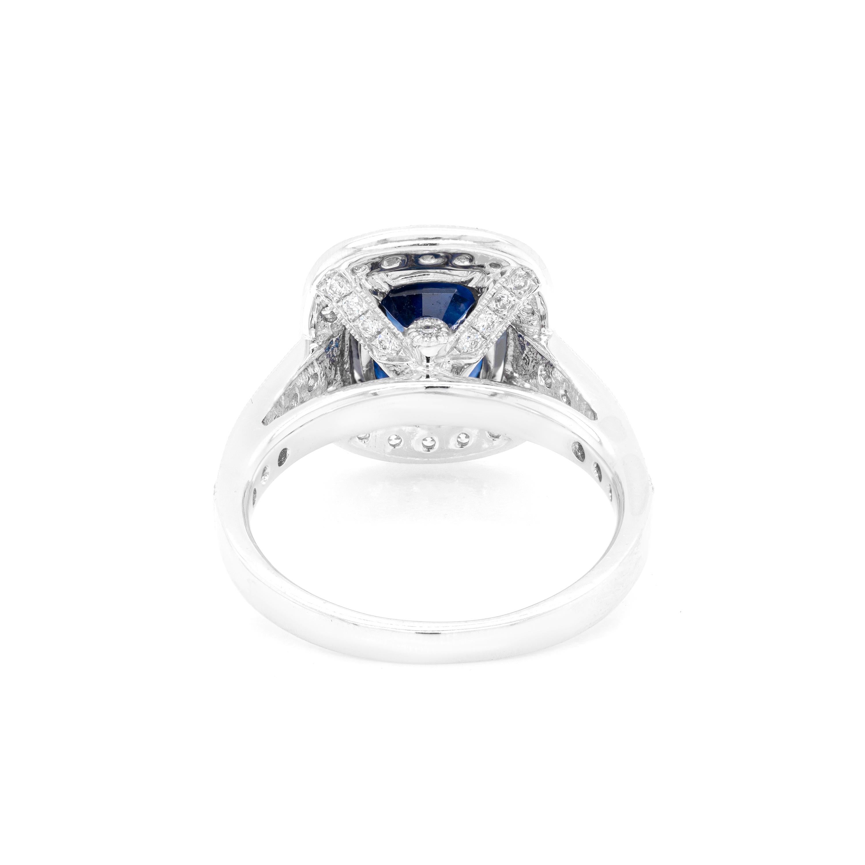 Modern 2.52ct Blue Sapphire & Diamond 18 Carat White Gold Halo Cluster Engagement Ring For Sale