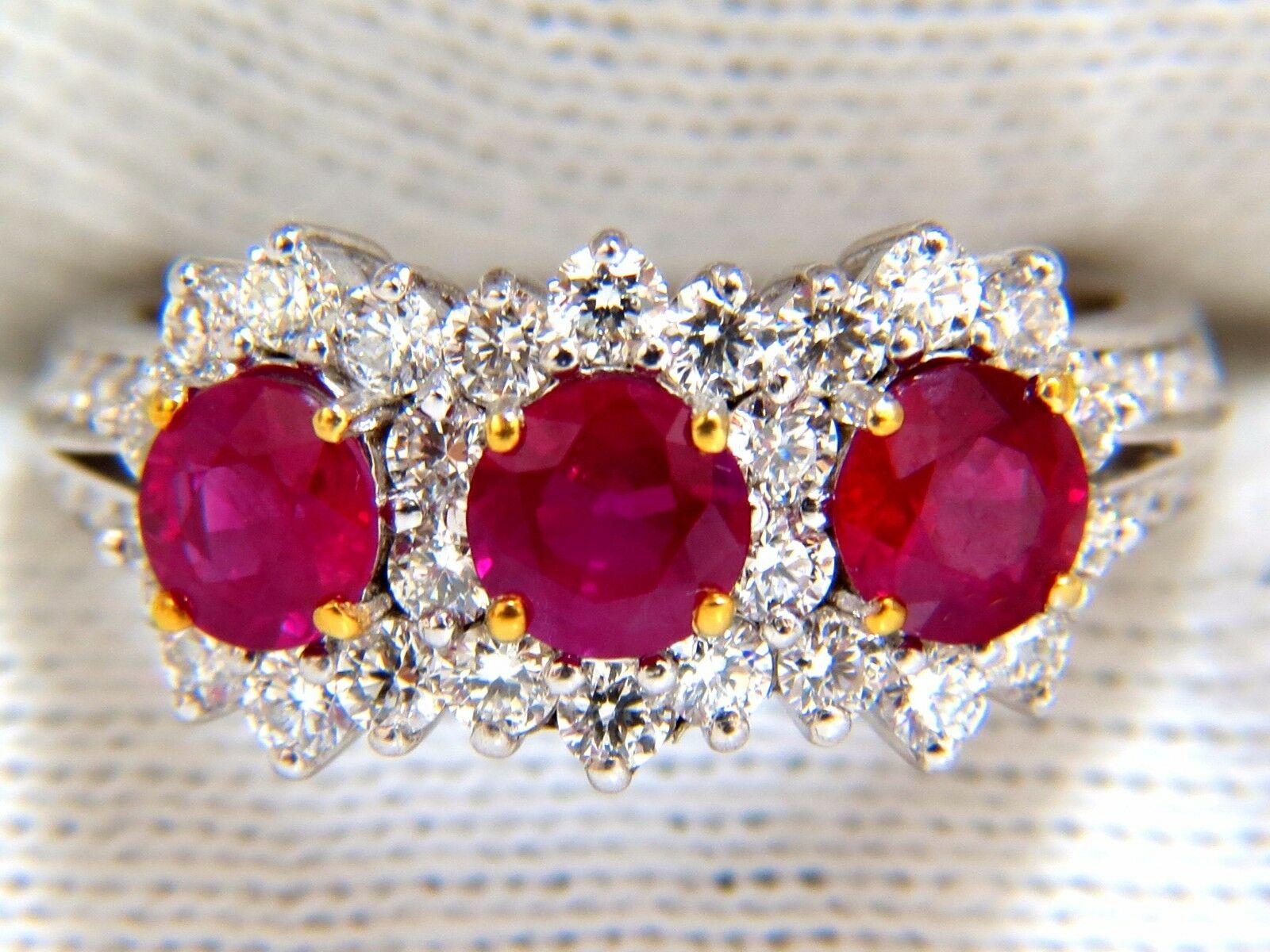 Ruby Halo Three's

1.42ct natural Rubies ring.

Vibrant vivid Reds

Transparent & clean clarity.

Round cut brilliants

4.4mm diameter 

1.00ct natural Side diamonds:

G-color Vs-2 clarity.

14kt. white gold

4.3 grams

Ring Current size: