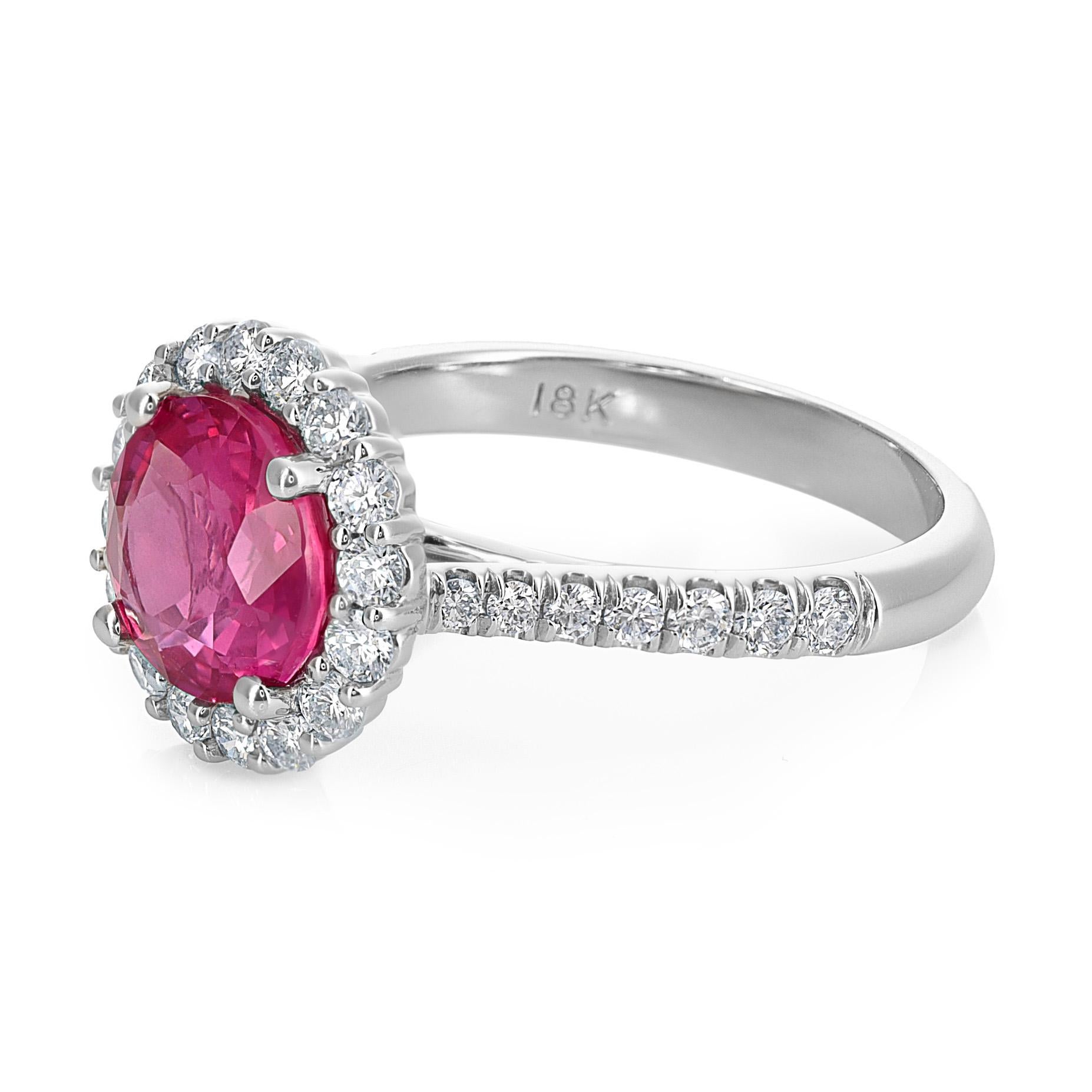 Immerse yourself in elegance with this 18K White Gold Ring featuring a 2.53 carats Natural Pink Sapphire in a charming round shape. The rosy hues of the Pink Sapphire are enriched through a meticulous heating process, enhancing its inherent beauty.