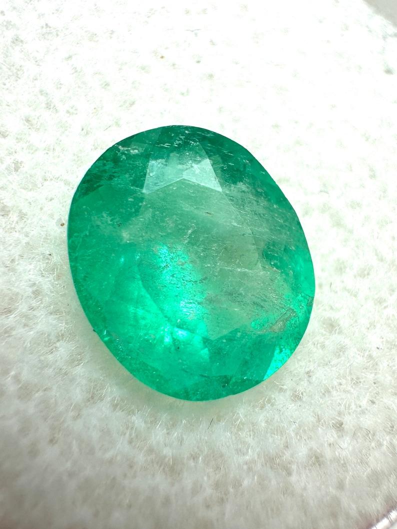 Stone: Emerald
Weight: 2.53-carats
Shape: Oval Cut
Clarity: Semi-Transparent
Luster: Good
Color: Green
Measurements: 9.90mm x 8.44mm x 5.31mm
Geographic Origin: Colombia
Treatment: Natural, Oiling

Comments: Due to their growth conditions in nature