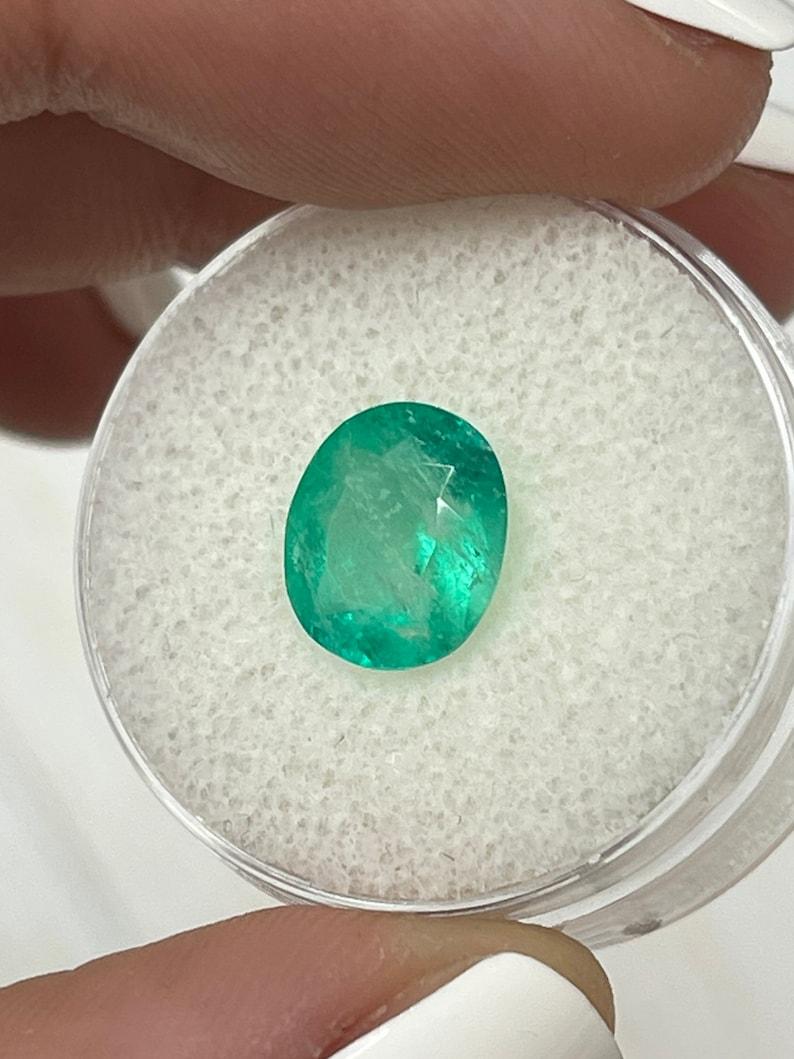 Women's or Men's 2.53 Carat 10x8.5 Green Colombian Emerald - Oval Cut May Birthstone Gem For Sale