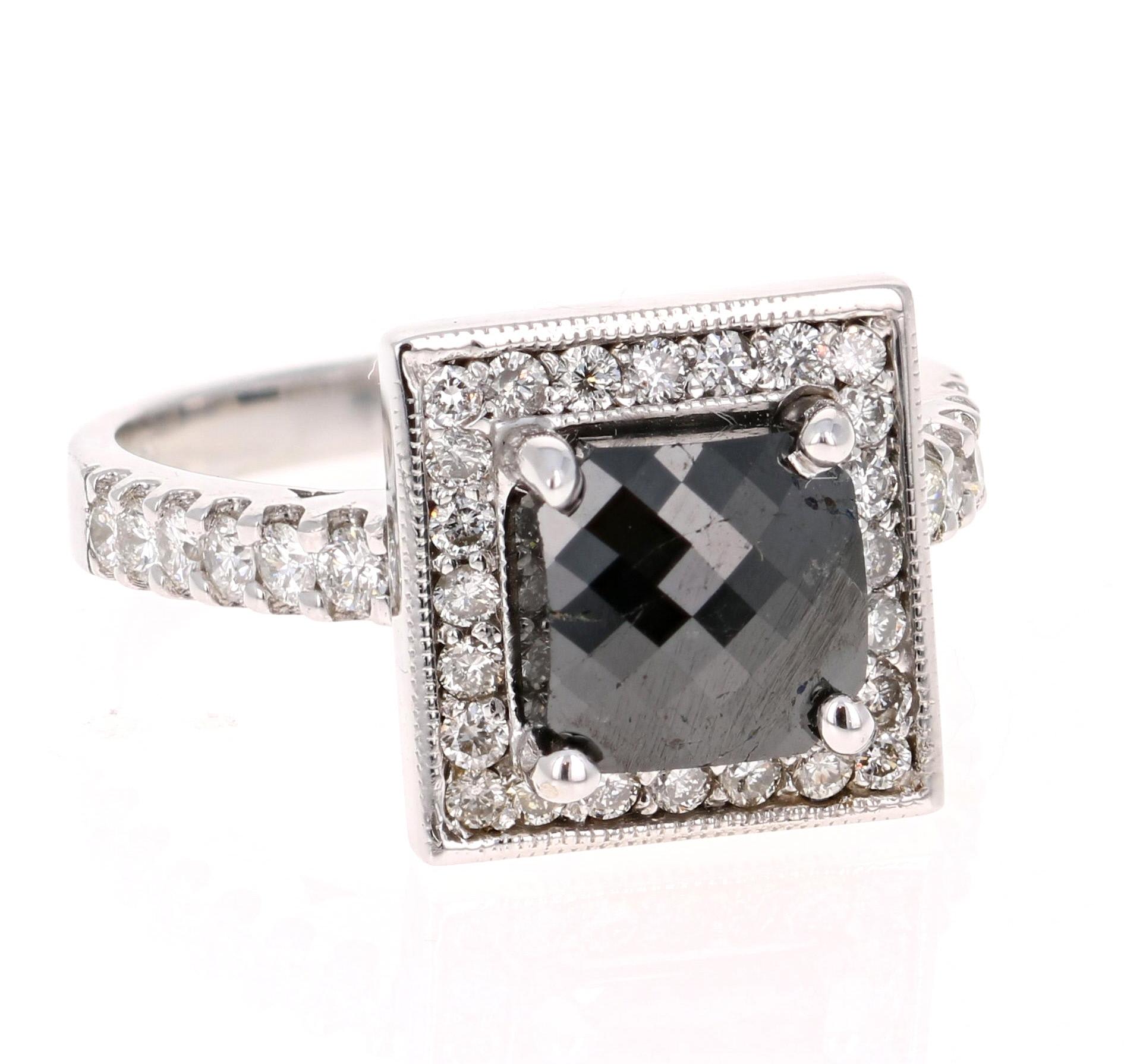 Gorgeous Black Diamond ring that can transform into an Engagement or Bridal Ring!  

There is a 1.89 carat Cushion Cut Black Diamond in the center which is surrounded by 37 Round Cut Diamonds that weigh 0.64 carats (Clarity: SI2, Color: F).  The