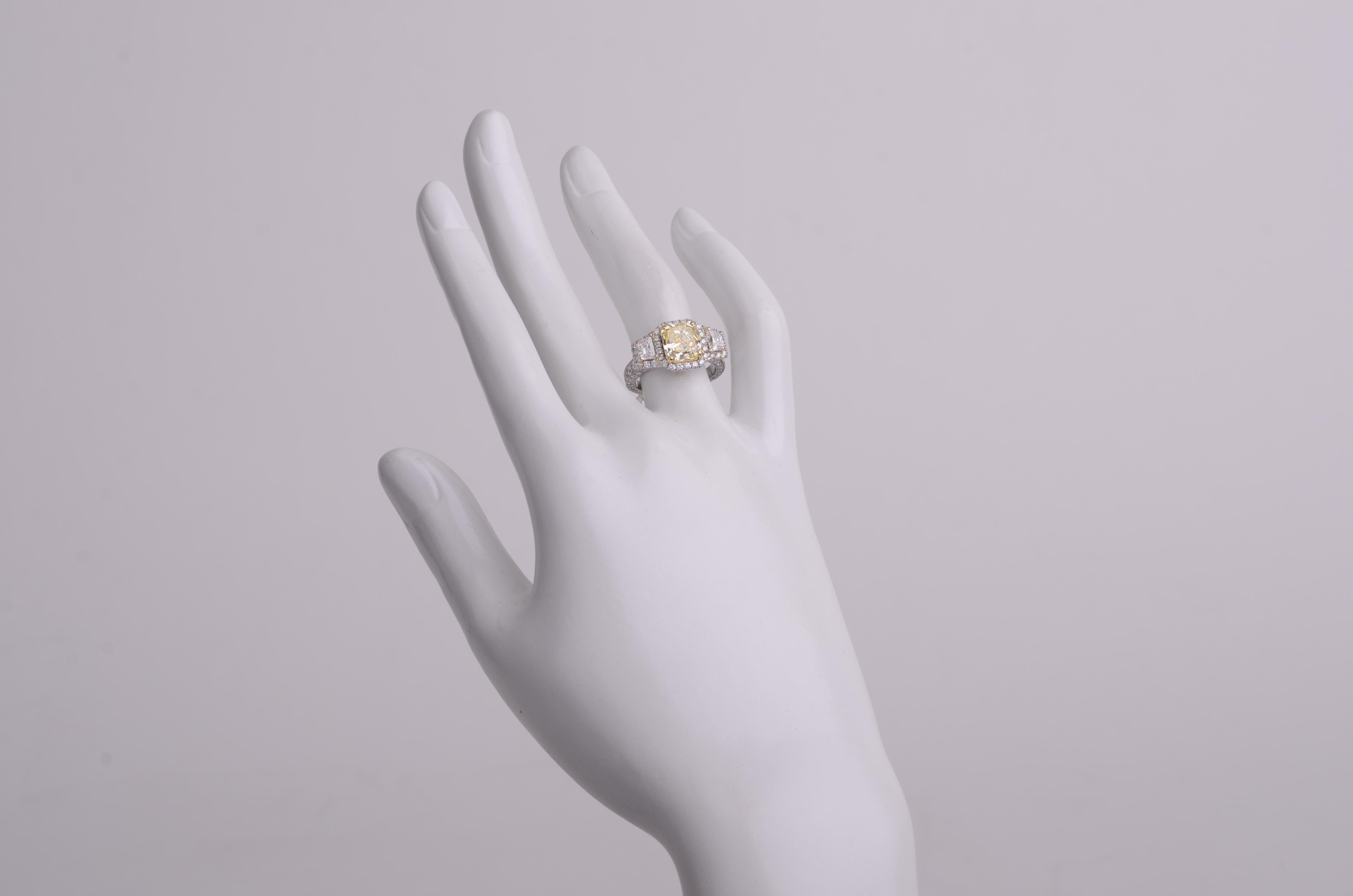 Radiant Cut 2.53 Carat Fancy Yellow Diamond Halo Ring 'VS2' For Sale