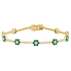 Pulsera de oro amarillo de 14K con diamantes naturales de 2,53 quilates y una flor de esmeraldas
