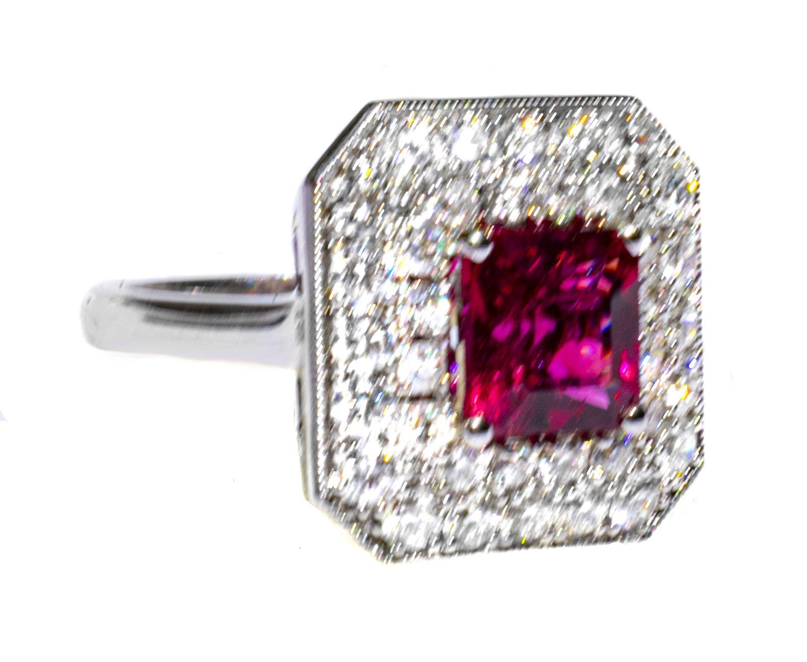Most jewelry stores don't even sell tourmaline, but If you know (and love!) colored gemstones, you know tourmalines!


This tourmaline looks exactly like a AAA ruby. It has that perfect 'ruby red' color with gorgeous red sparkle. Mined in