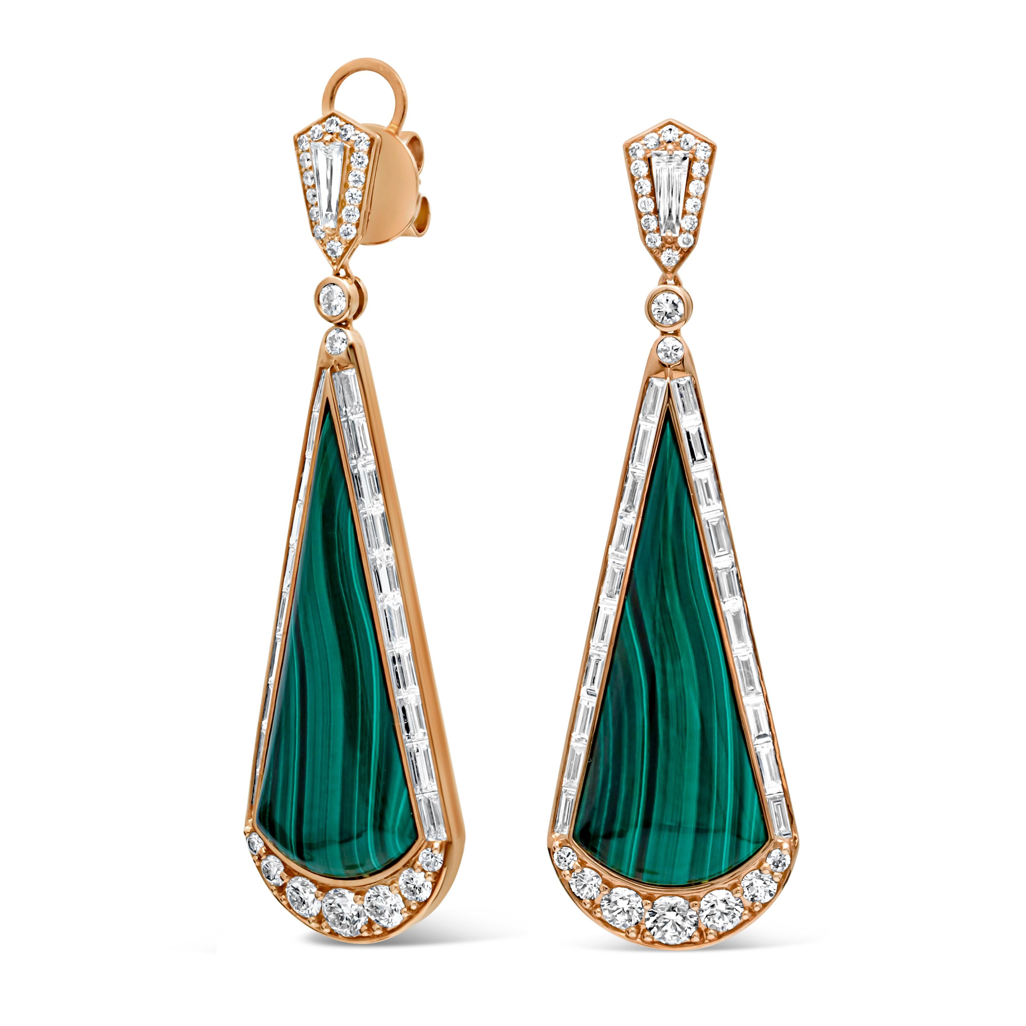 Showcasing a beautiful and fashionable dangle earrings set with color-rich brilliant trapezoid cut malachite weighing 25.30 carats total, surrounded by brilliant round and baguette cut diamonds in a timeless channel setting. Suspended on a diamond