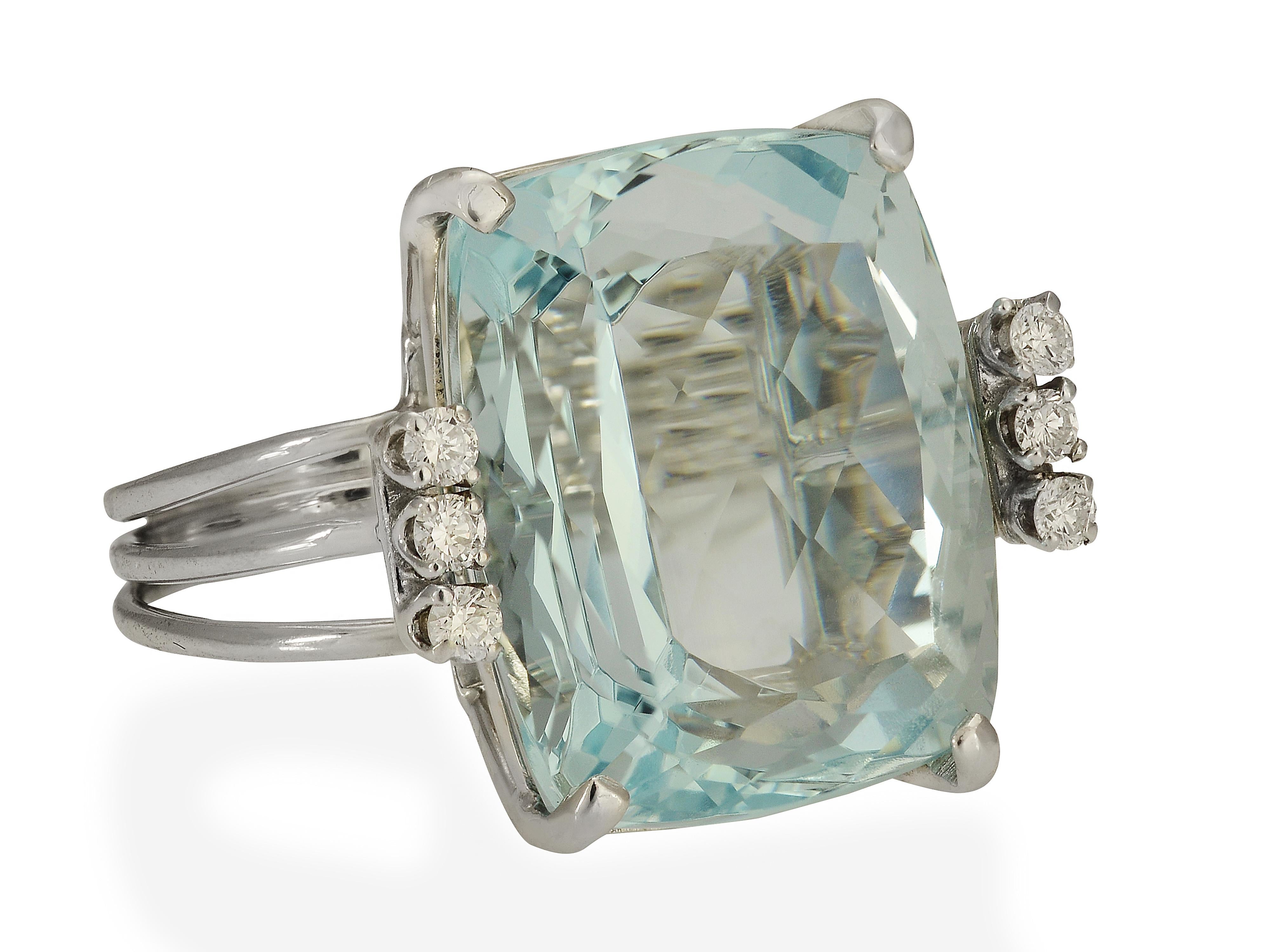 14 Karat White Gold Cocktail Ring Featuring a Prong Set 25.35 Carat Cushion Cut Aquamarine
6 Round Brilliant Cut Diamonds Total 0.18 Carats of VS Clarity & G Color
Finger Size 6.5 (purchase includes free sizing)
