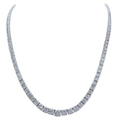 25.36 Carats Diamonds, 1.10 Carat Central Diamond, 18 Kt Gold Tennis Necklace.
