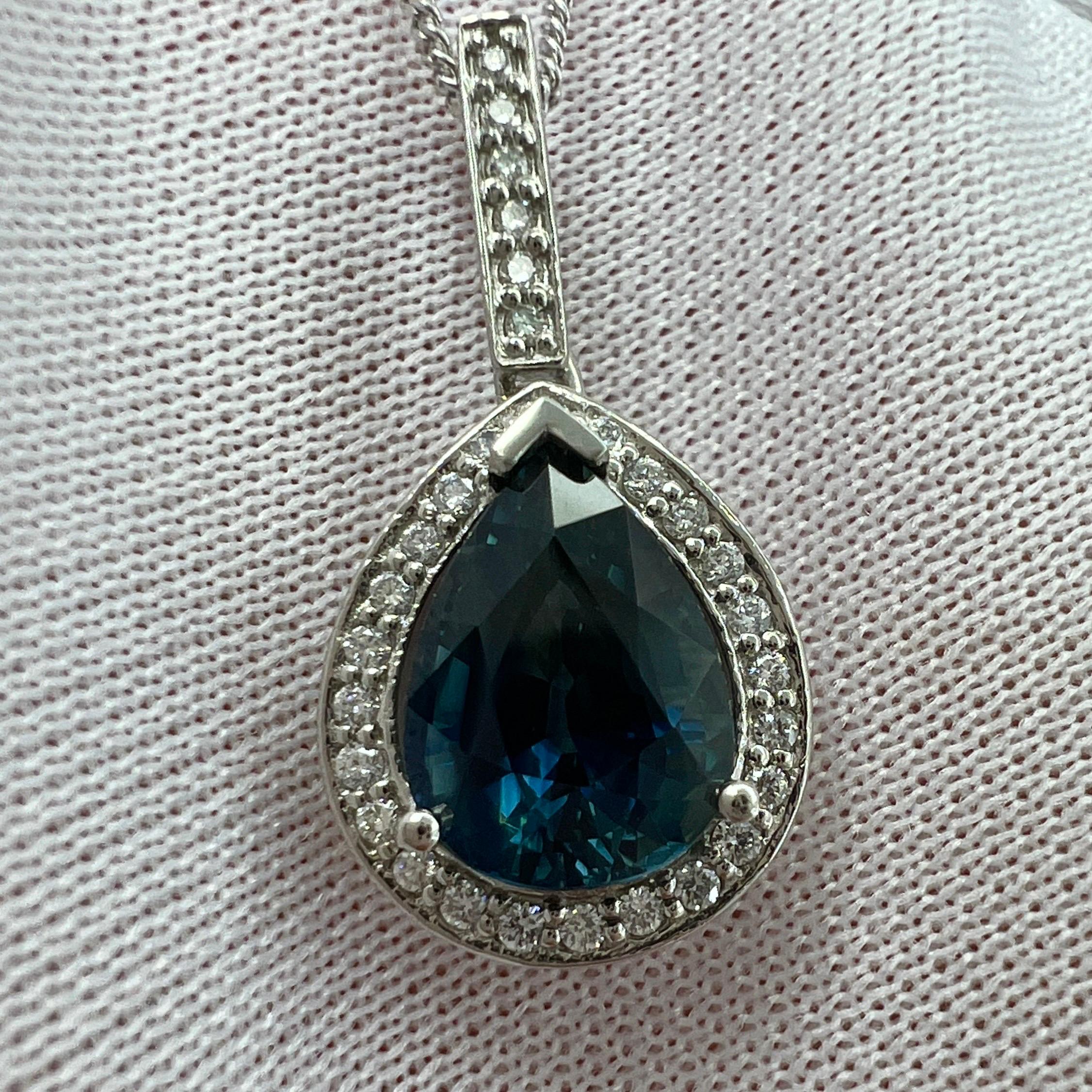 Fine Australian Green Blue Sapphire & Diamond Platinum Halo Pendant Necklace.

2.53 Carat pear cut sapphire with a stunning vivid green blue teal colour and excellent clarity. A very clean stone, VVS.
Ethically sourced Australian stone.

This