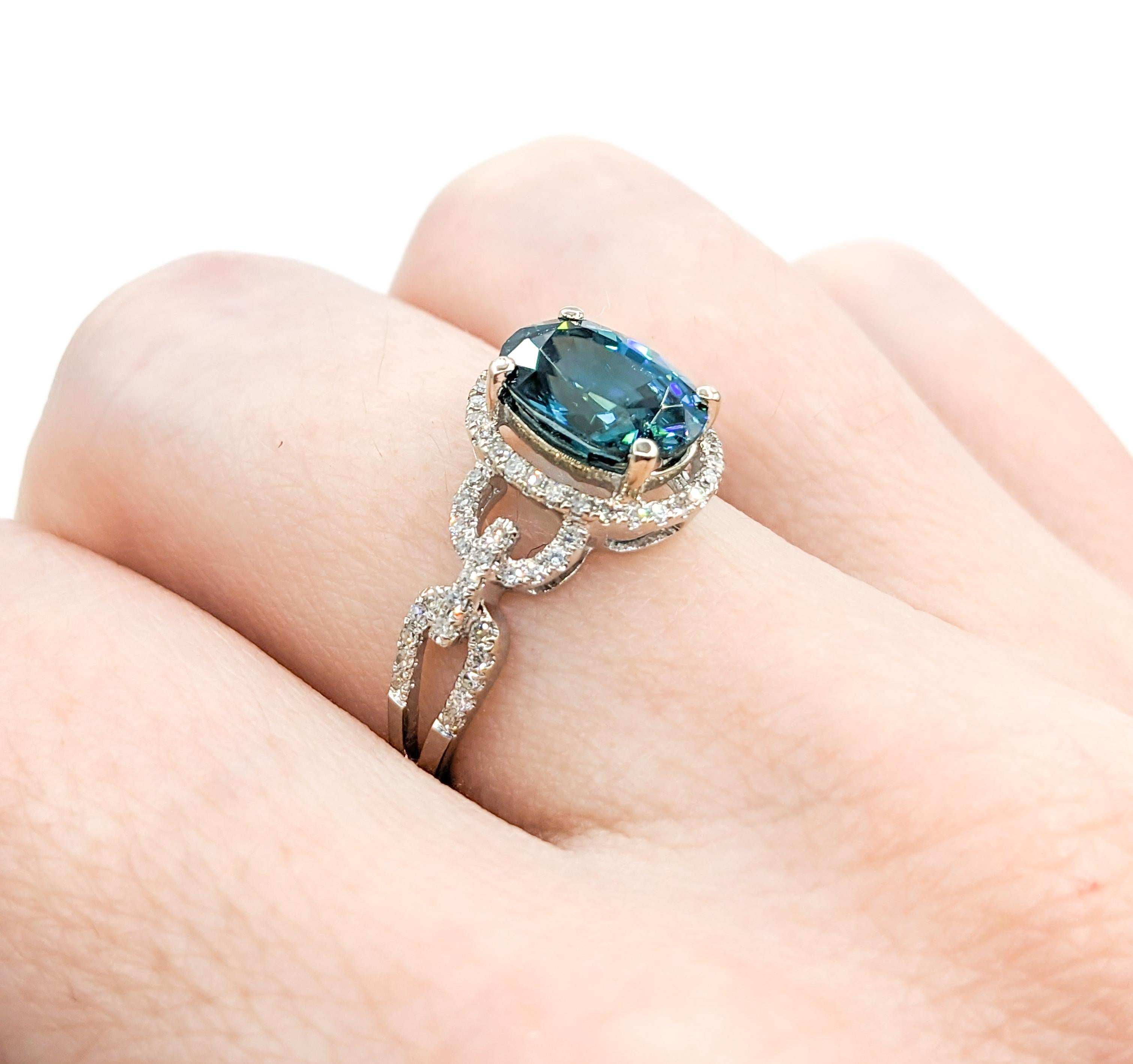 Vibrant 2.53ct Blue Zircon & Diamond Fashion Ring

Unveiling our stunning ring, a piece that eloquently weaves sophistication with a dash of celestial charm, elegantly crafted in 14k white gold. This ring features .20ctw of round diamonds, each