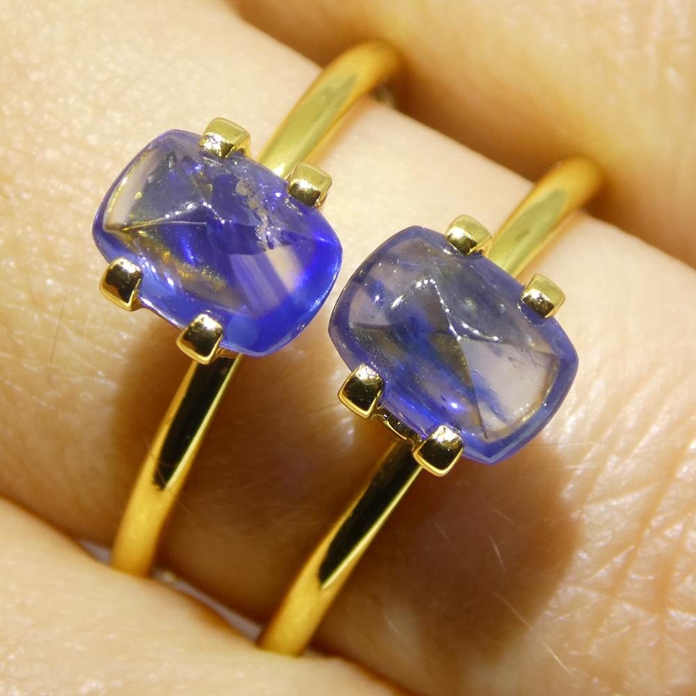 Descrizione:

Tipo di gemma: Zaffiro 
Numero di pietre: 2
Peso: 2,53 carati
Misure: 7,4 x 5,5 x 3,37 mm e 7,4 x 5,5 x 3,06 mm
Forma: Cuscino Cabochon Pan di Zucchero
Stile di taglio Corona: 
Stile di taglio del padiglione:  
Trasparenza: