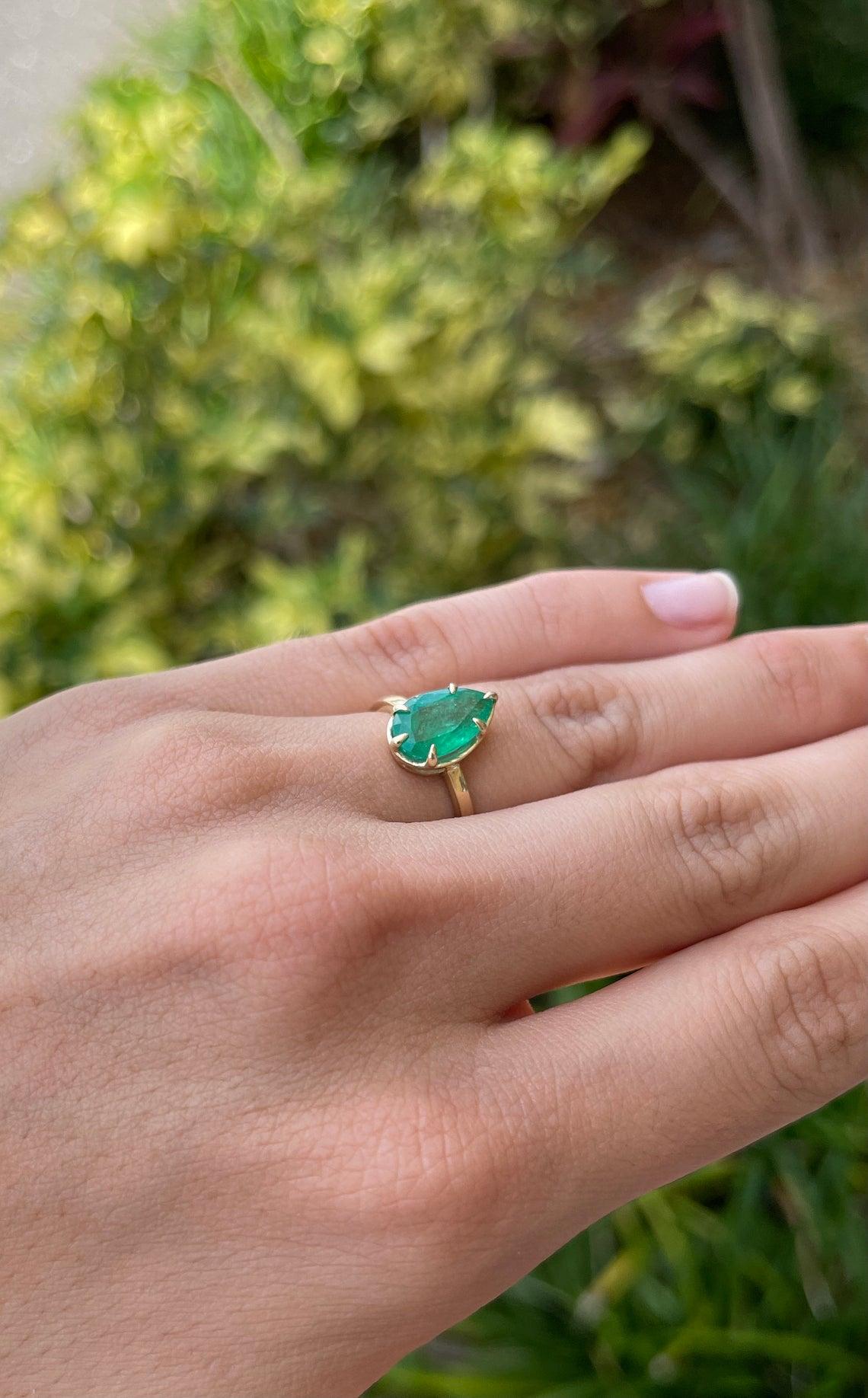 emerald pear cut ring