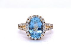 2.54 Carat Aquamarine Ring with Diamond Accents set in 18 Karat Yellow Gold