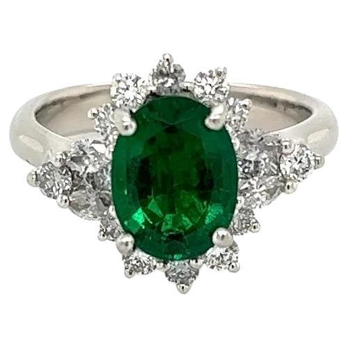 2.54 Carat Oval Green Emerald GIA and Diamond Vintage Platinum Ring For Sale