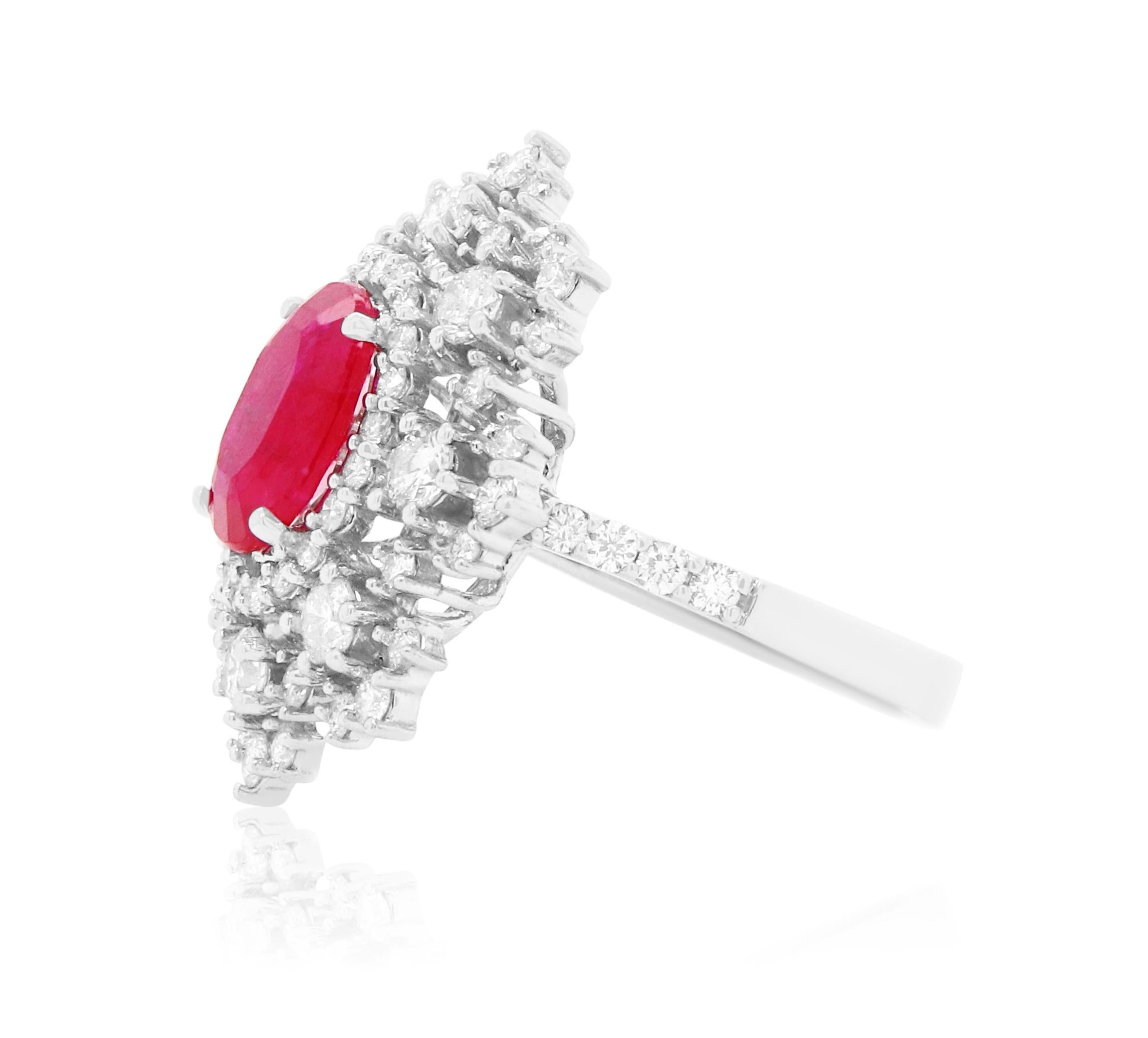 Material: 14k White Gold 
Center Stone Details: 2.54 Carat Oval Ruby measuring 9.6 x 8.2 mm
Mounting Diamond Details: 70 Brilliant Round White Diamonds at 1.75 Carats - Clarity: SI / Color: H-I
Complimentary sizing on all Alberto rings

Fine