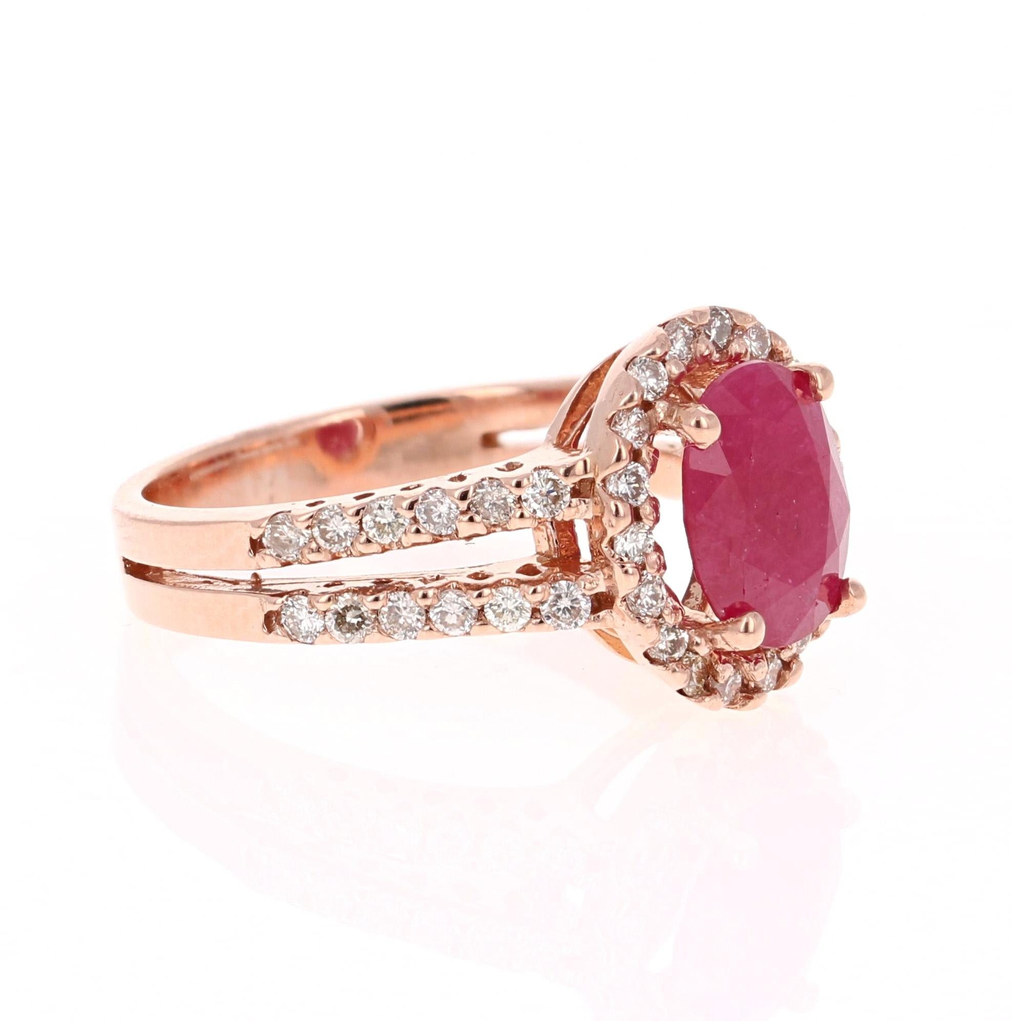 This ring is truly a beauty and can easily be transformed into a unique engagement or bridal ring!
There is a Oval Cut Ruby set in the center of the ring that weighs 1.95 carats.  There are also 42 Round Cut Diamonds that weigh 0.59 carats (Clarity: