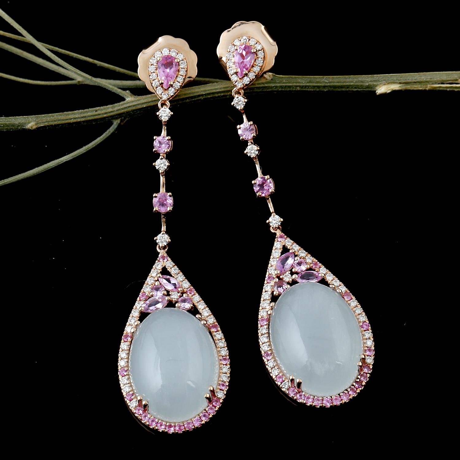 Cast in 14-karat gold, these beautiful earrings are hand set with 25.47 carats of Aquamarine, 1.96 carat Pink Sapphire and .81 carats of sparkling diamonds. 

FOLLOW  MEGHNA JEWELS storefront to view the latest collection & exclusive pieces.  Meghna