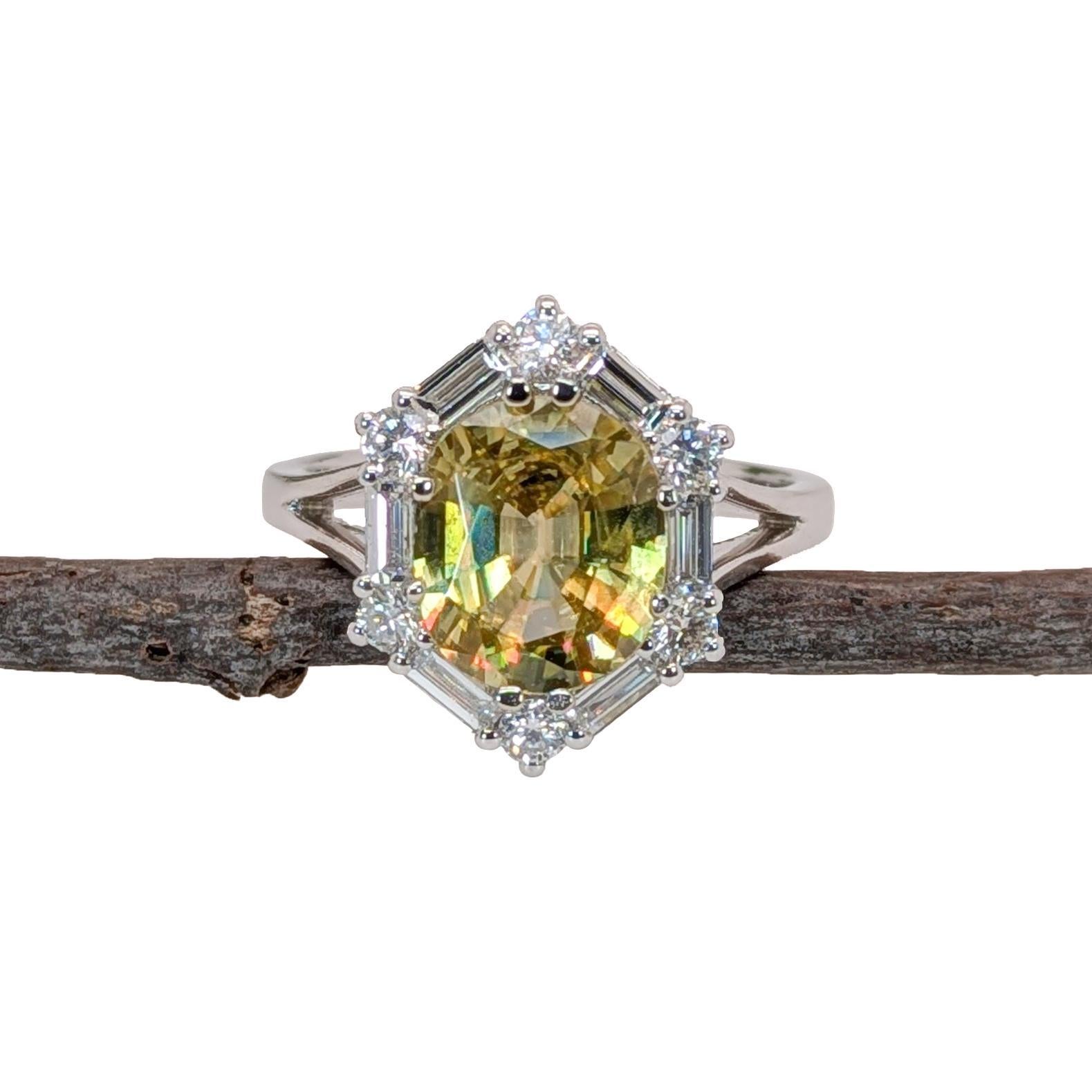 This beautiful ring features a 2.54 carat oval Sphene gemstone with natural earth mined diamonds set in solid 14K white gold. An excellent piece for a true collector of rare and valuable gems!

**We offer complimentary resizing, message us the