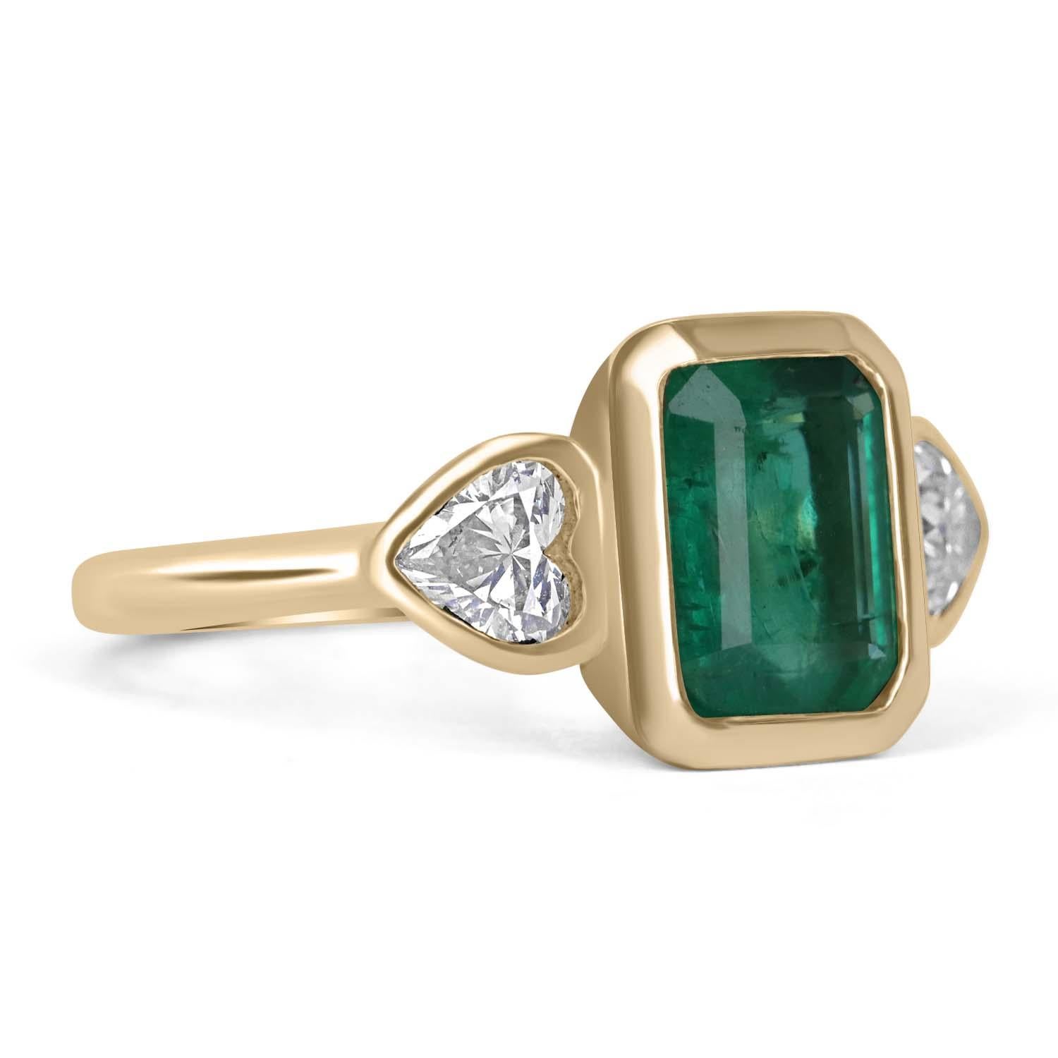 Shower her with love with this emerald and diamond heart cocktail ring. Designed and created by our own master jeweler, 