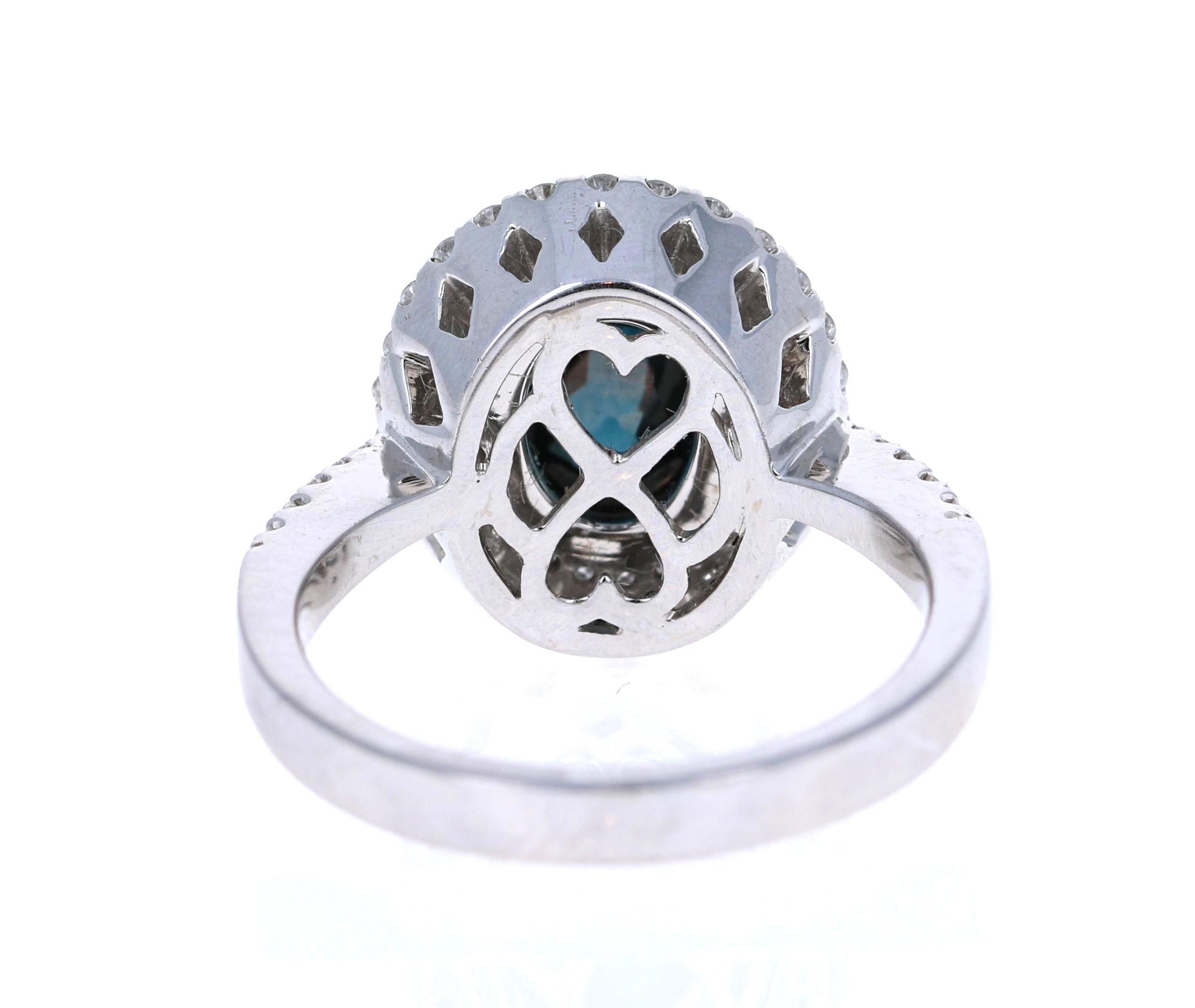 Oval Cut 2.55 Carat Blue Sapphire 14 Karat Halo Diamond White Gold Ring