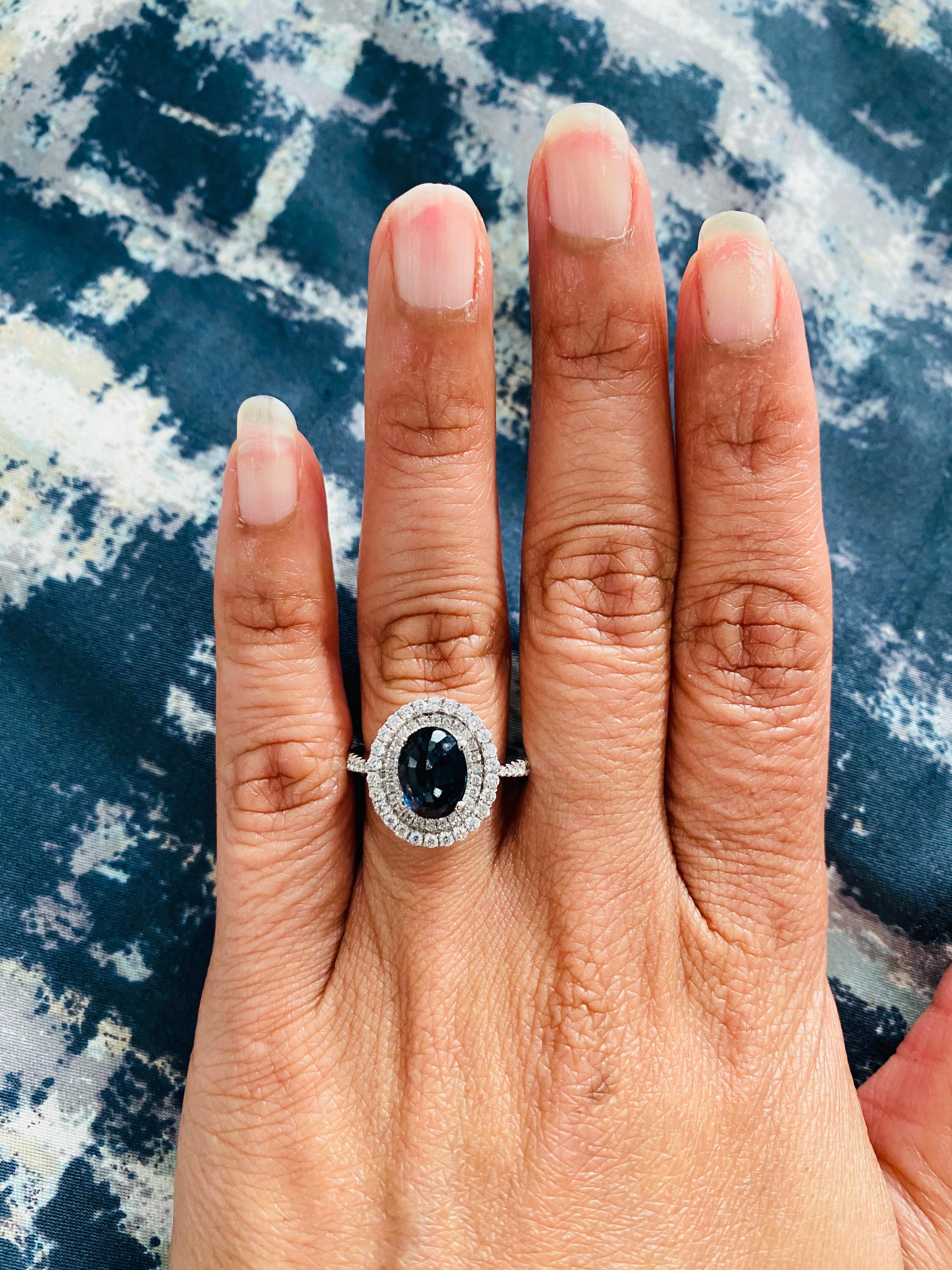 Women's 2.55 Carat Blue Sapphire 14 Karat Halo Diamond White Gold Ring For Sale
