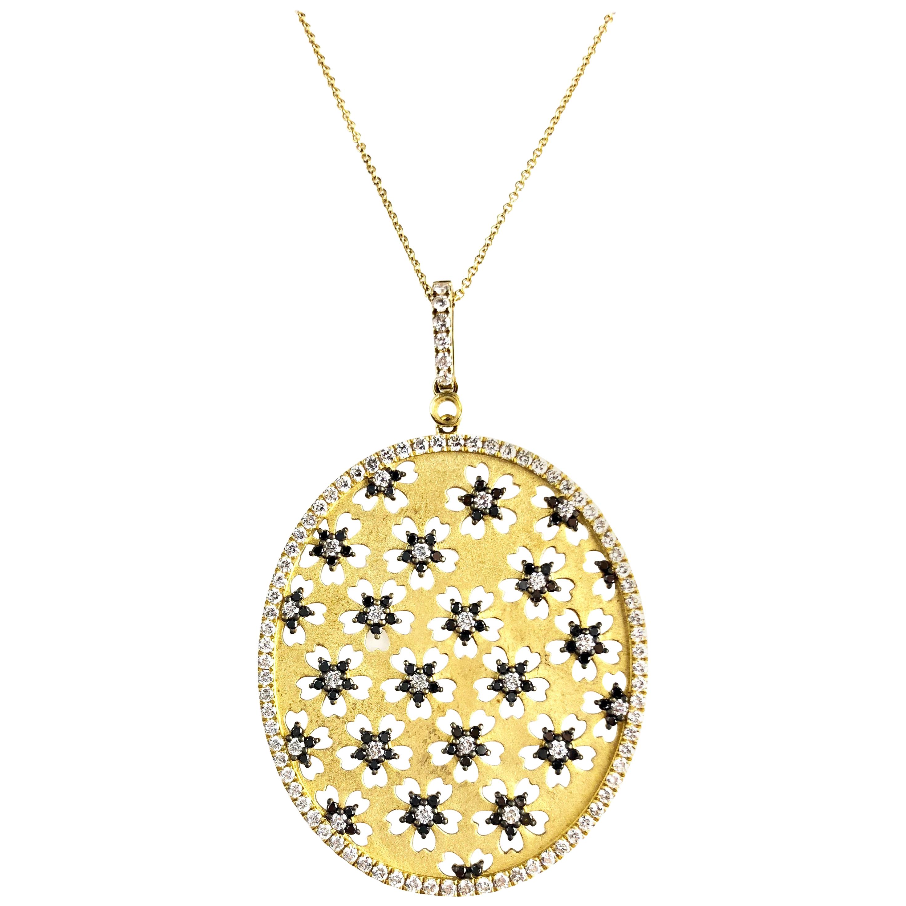2.55 Carat Diamond and Black Diamond Flower Oval Pendant in 18 Karat Yellow Gold