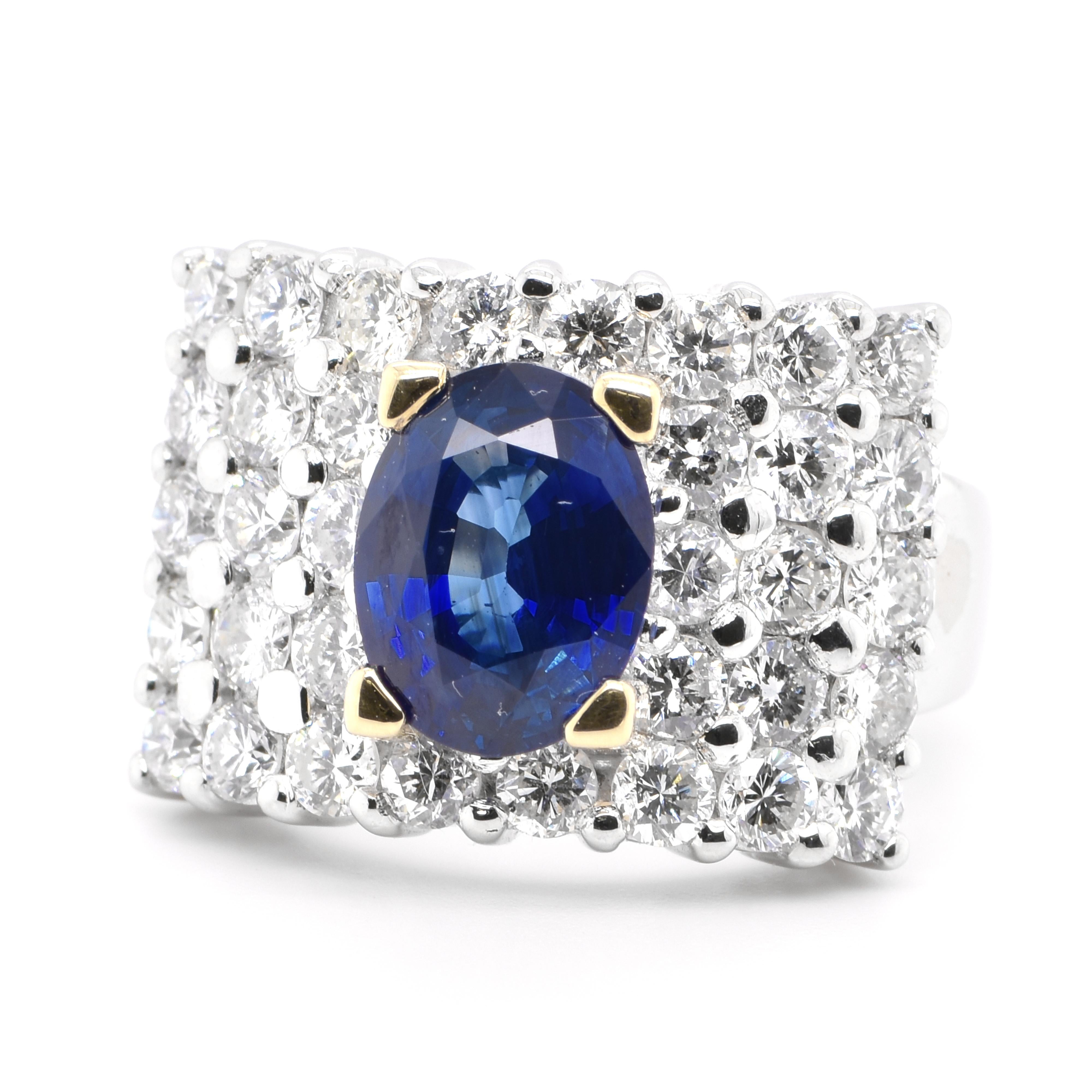 A beautiful Ring featuring a 2.55 Carat Natural Blue Sapphire and 2.18 Carats Diamond Accents set in Platinum. Sapphires have extraordinary durability - they excel in hardness as well as toughness and durability making them very popular in jewelry.