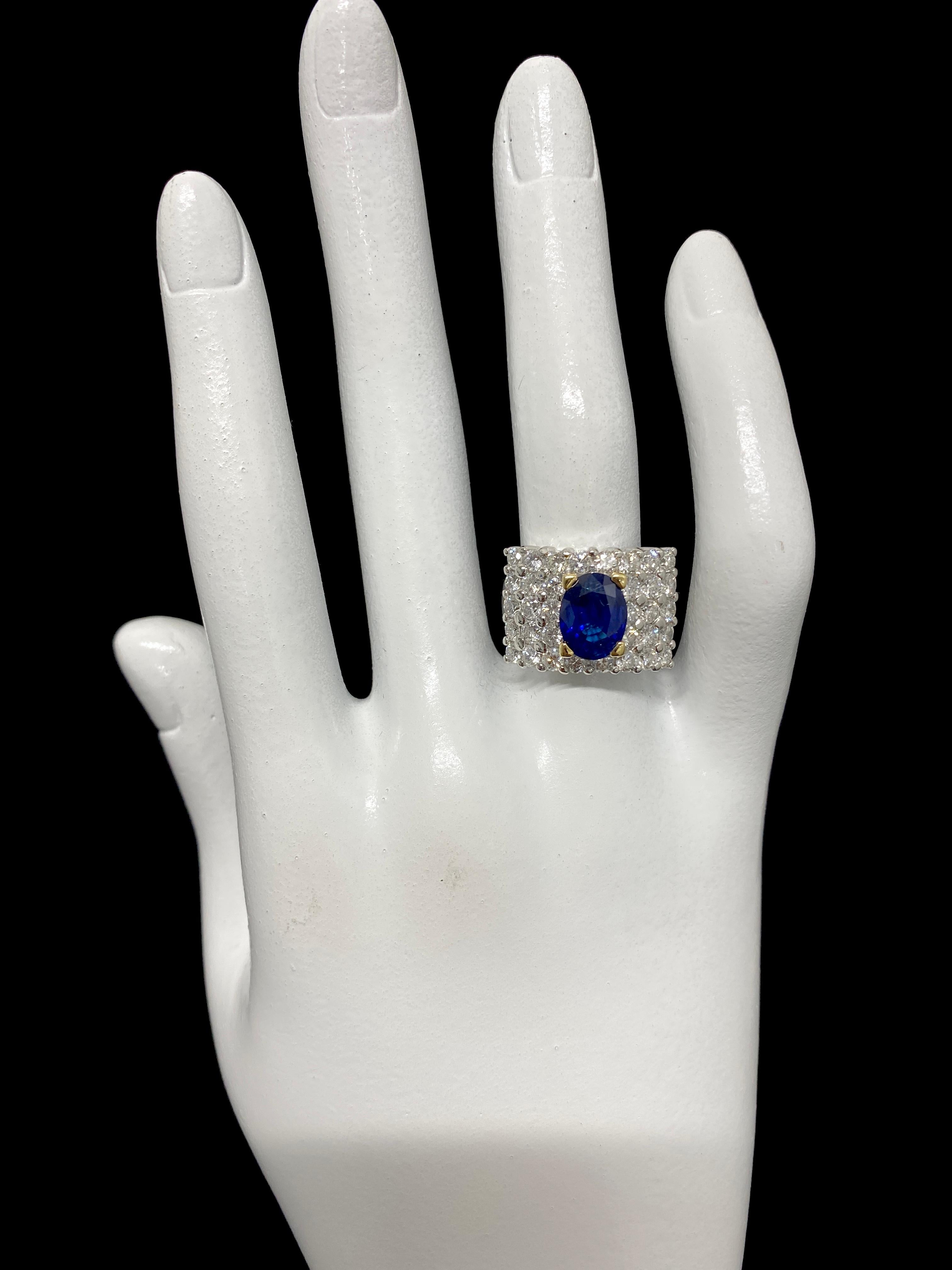 Oval Cut 2.55 Carat Natural Blue Sapphire and Diamond Ring Set in Platinum and 18K Gold