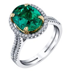 2.55 Carat Oval Emerald and Diamond Halo White, Yellow Gold Cocktail Ring