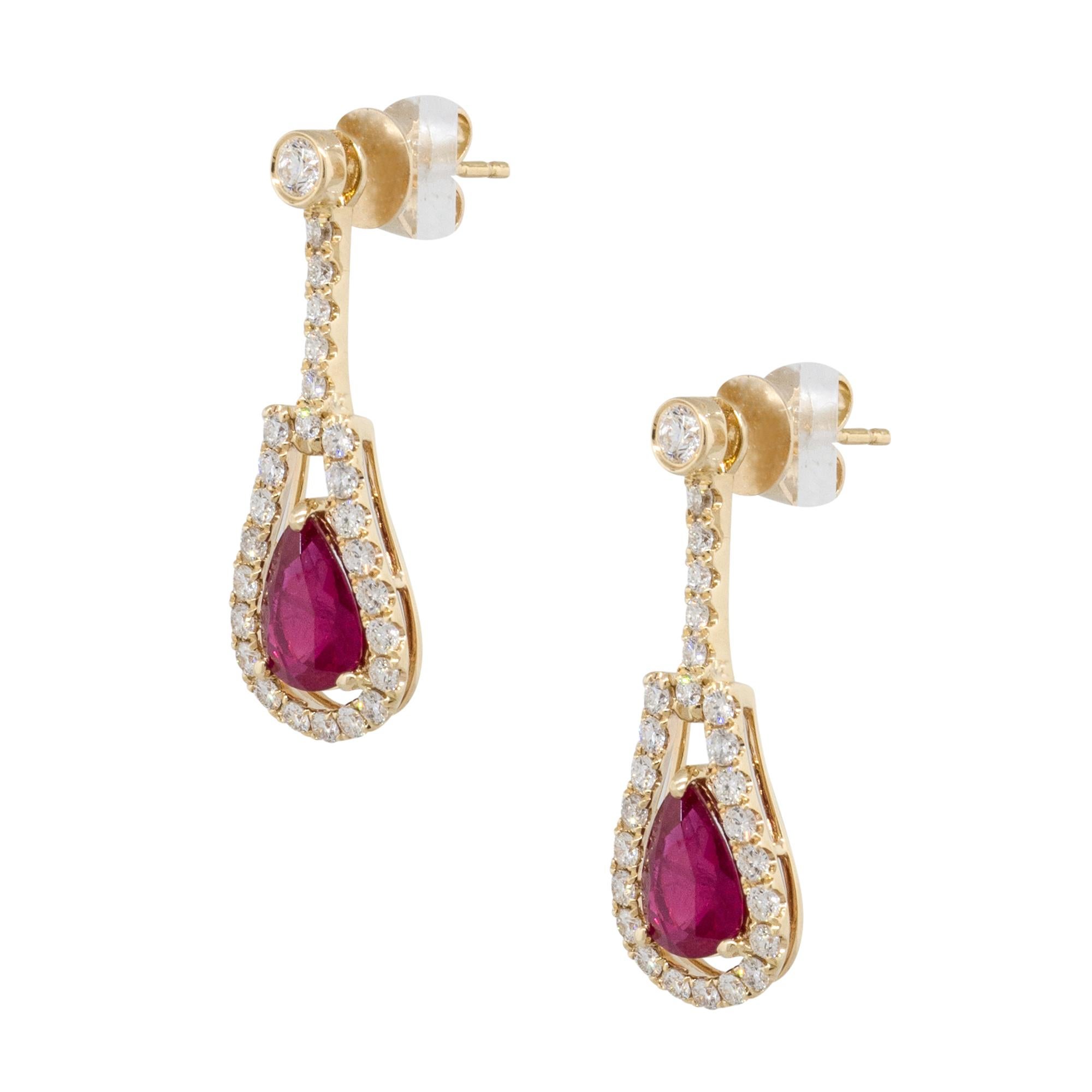 Material: 14k yellow Gold
Style: Ruby Dangle Earrings With Diamonds
Gemstone Details:	Approx. 2.55ctw of pear shape Rubies
Diamond Details: Approx. 1.02ctw of round cut Diamonds. Diamonds are G/H in color and VS in clarity
Earring Measurements: