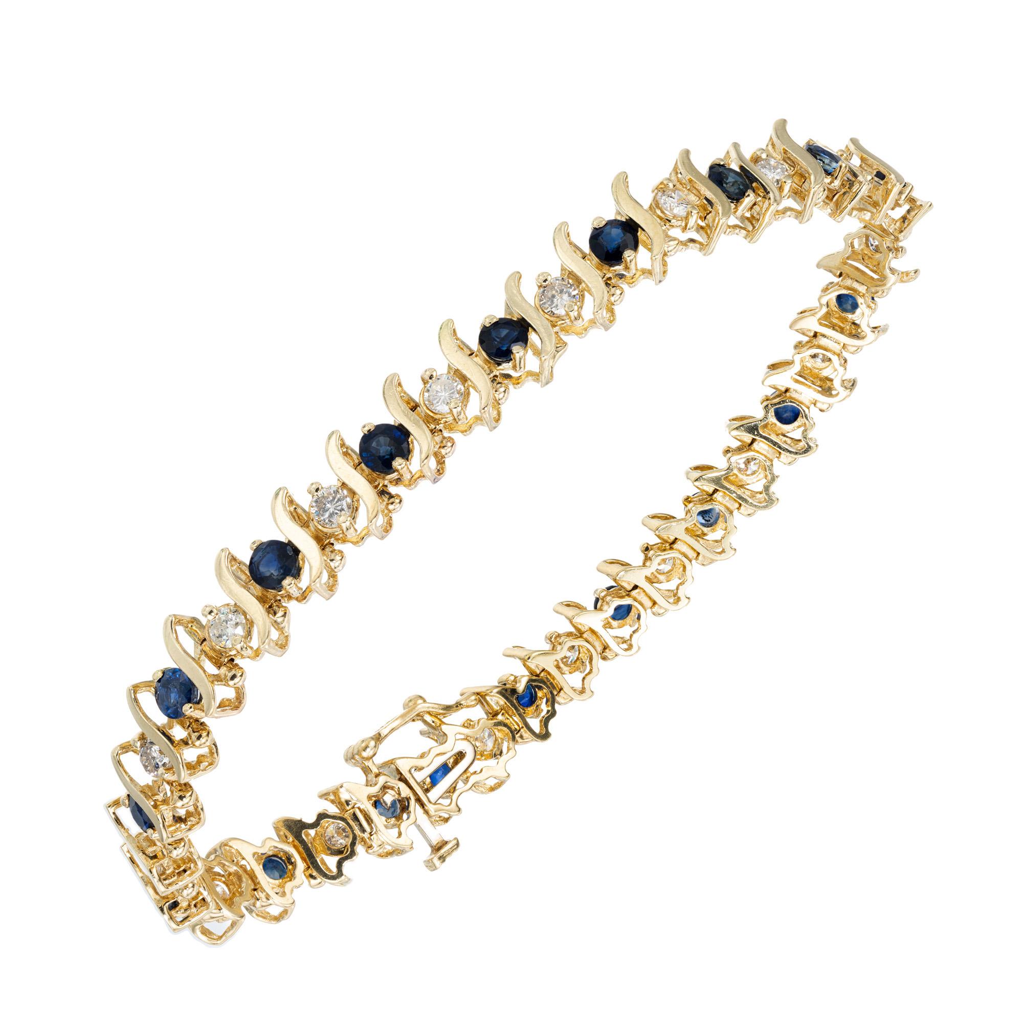 Early 1980's Diamond and Sapphire patterned yellow gold bracelet. S link. 17 round sapphires totaling 2.55cts alternating with 17 round cut diamonds with gold S wave spacers between them. 7 inches in length. 

17 genuine Sapphires approx. total