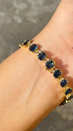 25.5 Carat Sapphire and Diamond Bezel Set Tennis Bracelet in 18K Yellow Gold