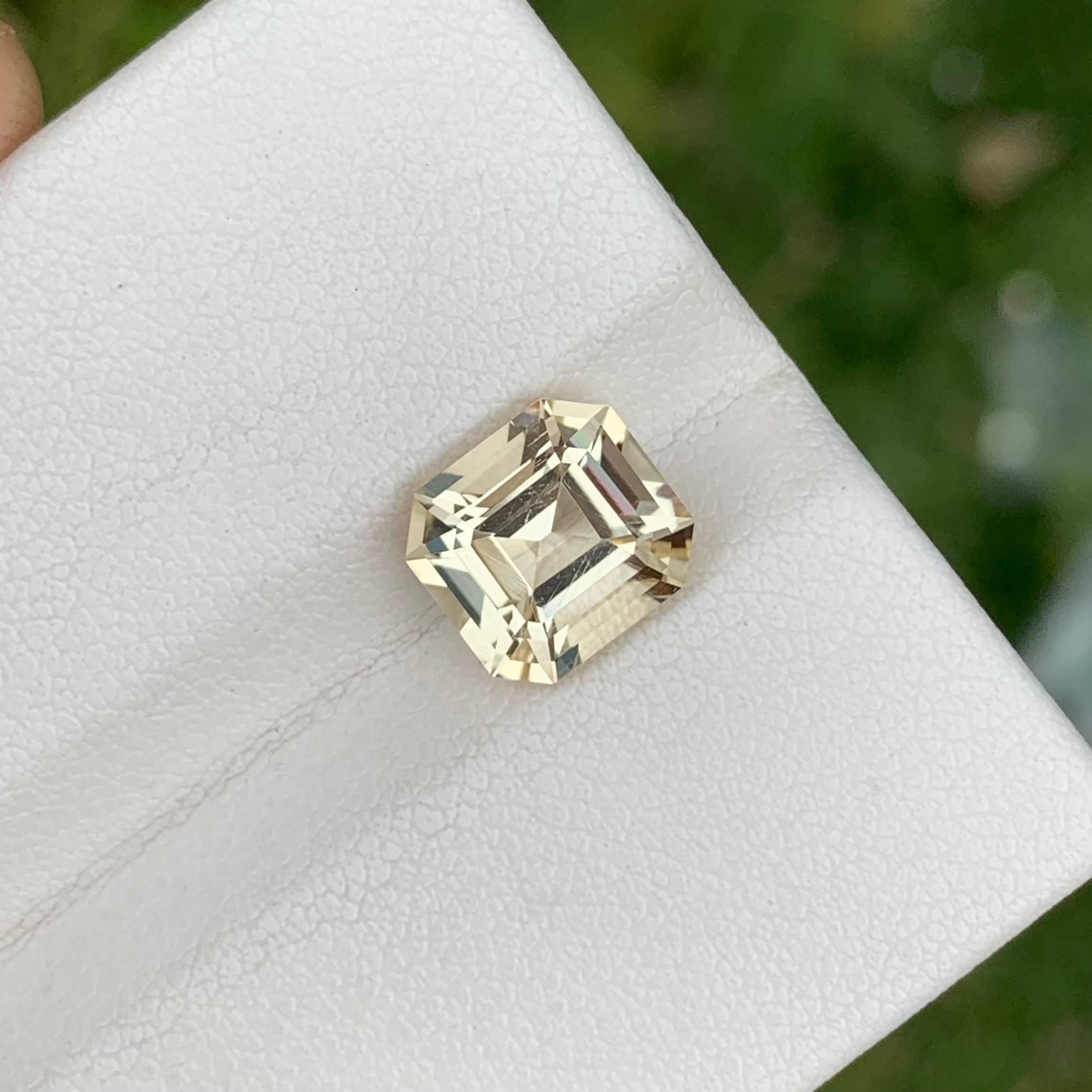 Women's or Men's 2.55 Carats Light Yellow Loose Scapolite Stone Asscher Cut Tanzanian Gemstone For Sale