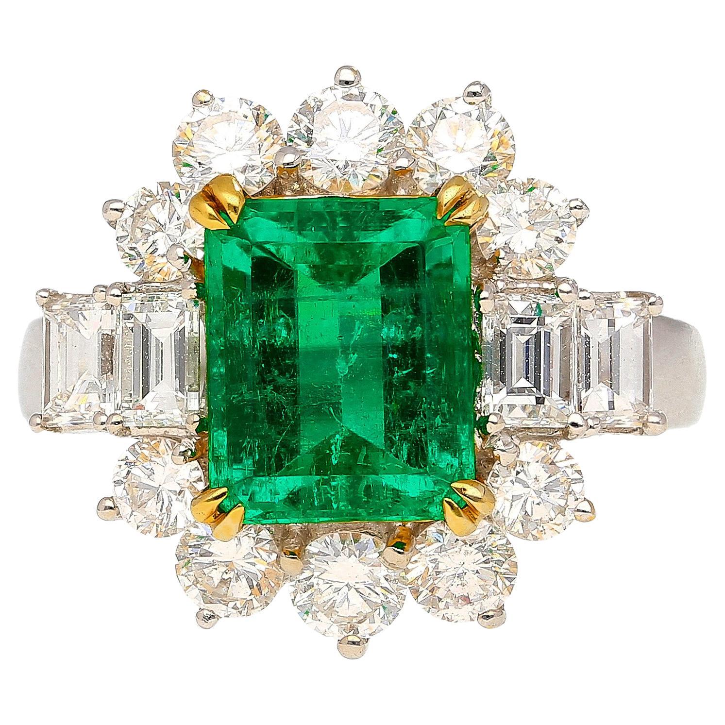 2.55 Colombian Emerald With Round & Emerald Cut Diamonds Sides Ring in 18K Gold